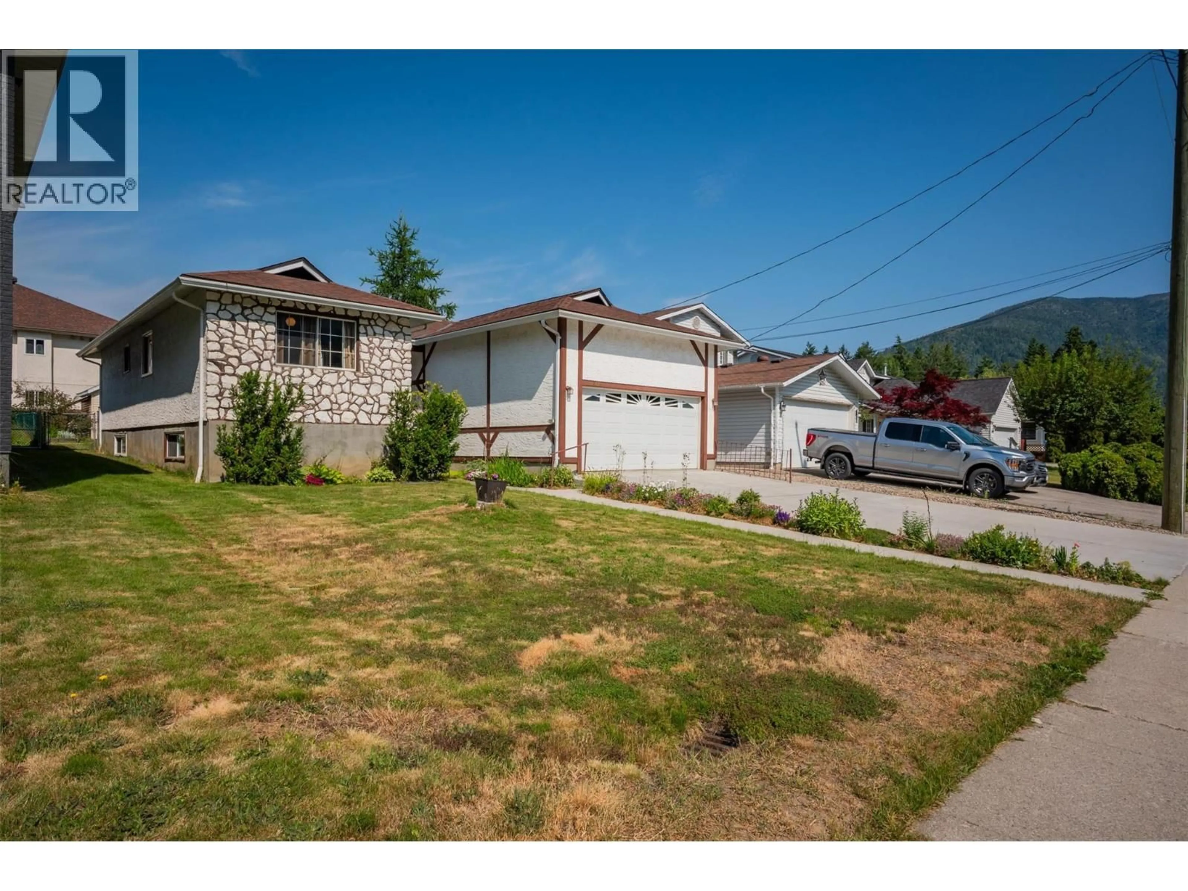 A pic from outside/outdoor area/front of a property/back of a property/a pic from drone, street for 1820 SILVER KING ROAD, Nelson British Columbia V1L1C7
