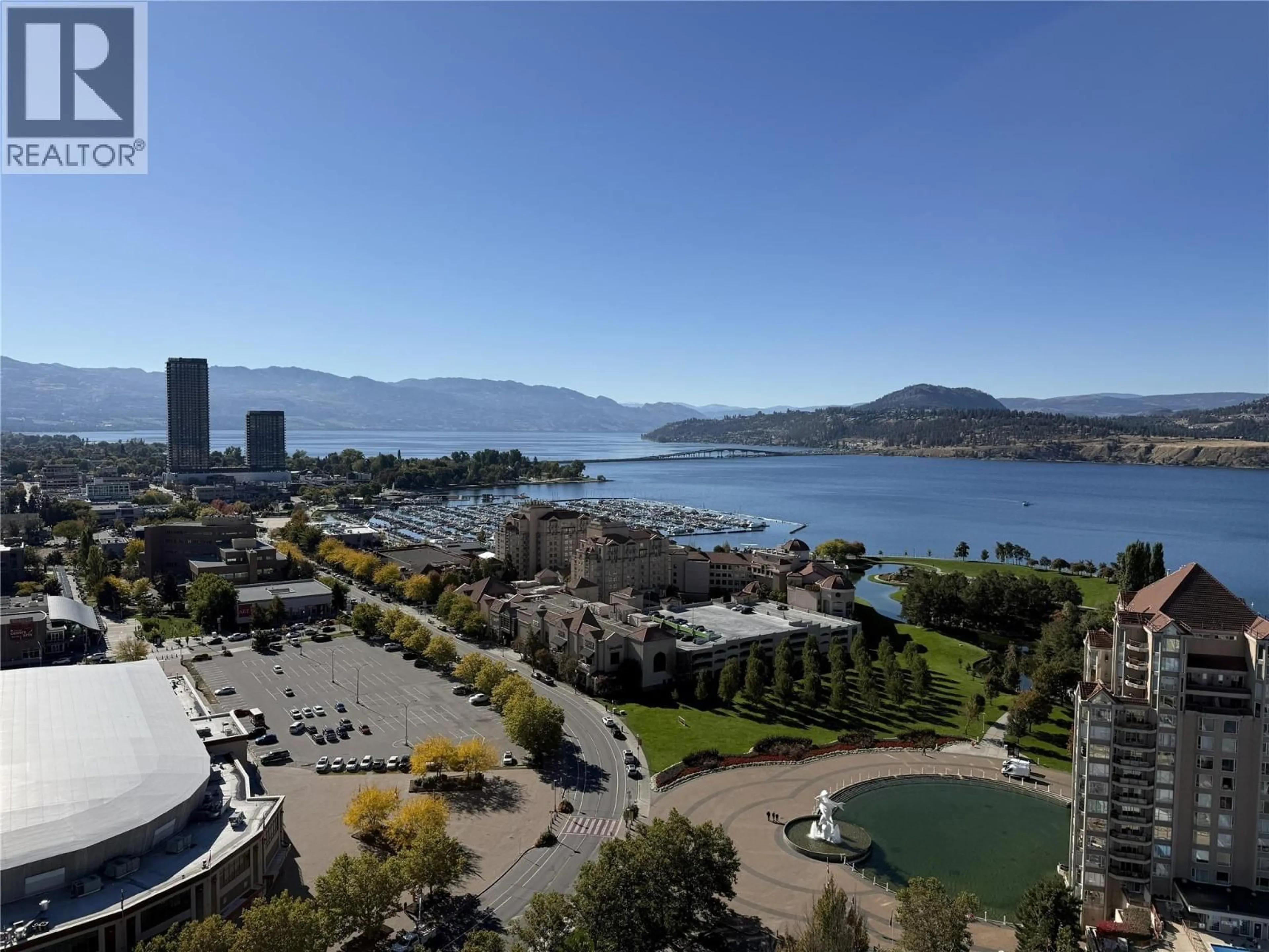 A pic from outside/outdoor area/front of a property/back of a property/a pic from drone, water/lake/river/ocean view for 2305 - 1181 SUNSET DRIVE, Kelowna British Columbia V1Y0L4