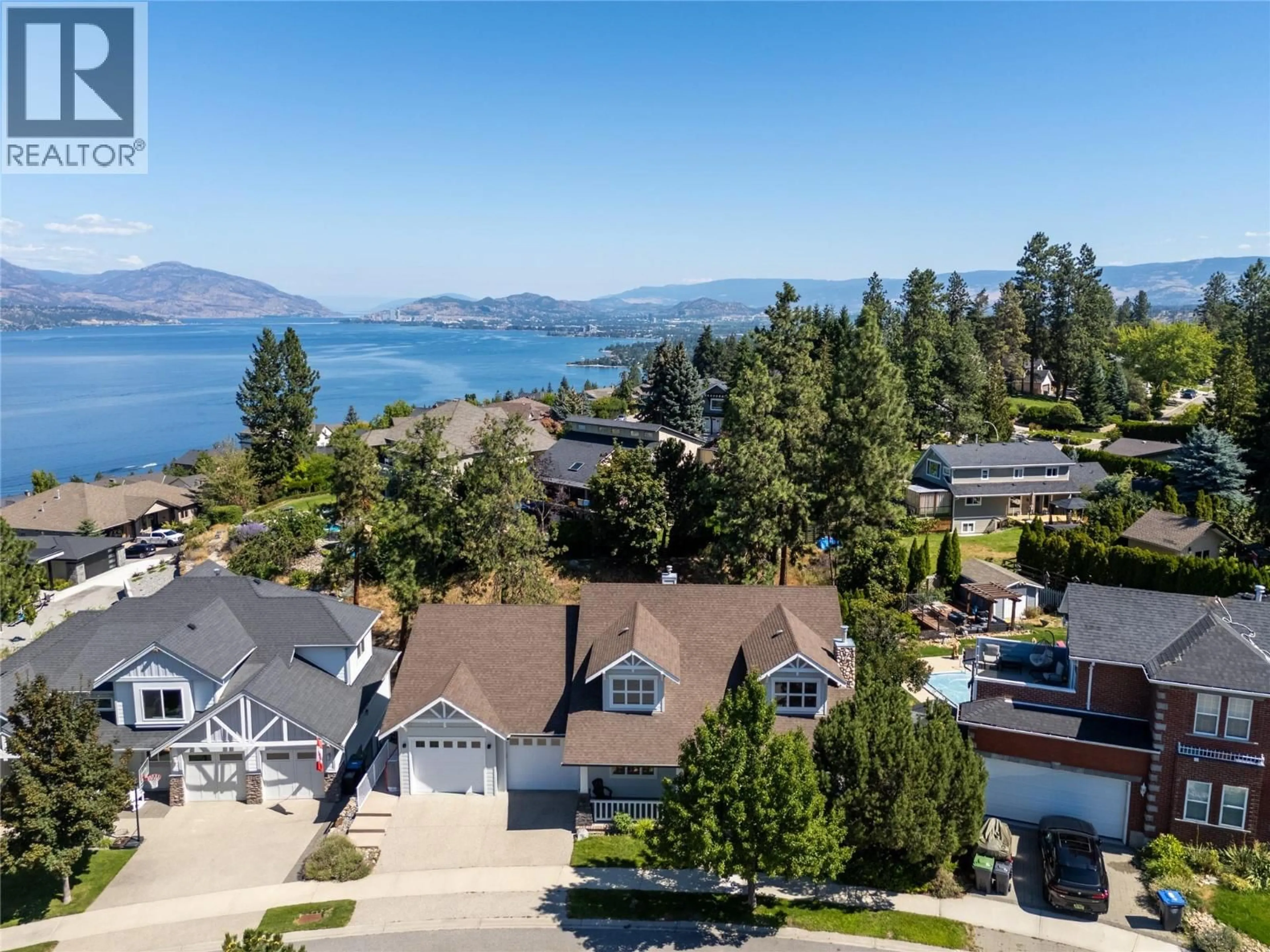 A pic from outside/outdoor area/front of a property/back of a property/a pic from drone, water/lake/river/ocean view for 408 QUILCHENA CRESCENT, Kelowna British Columbia V1W4W4