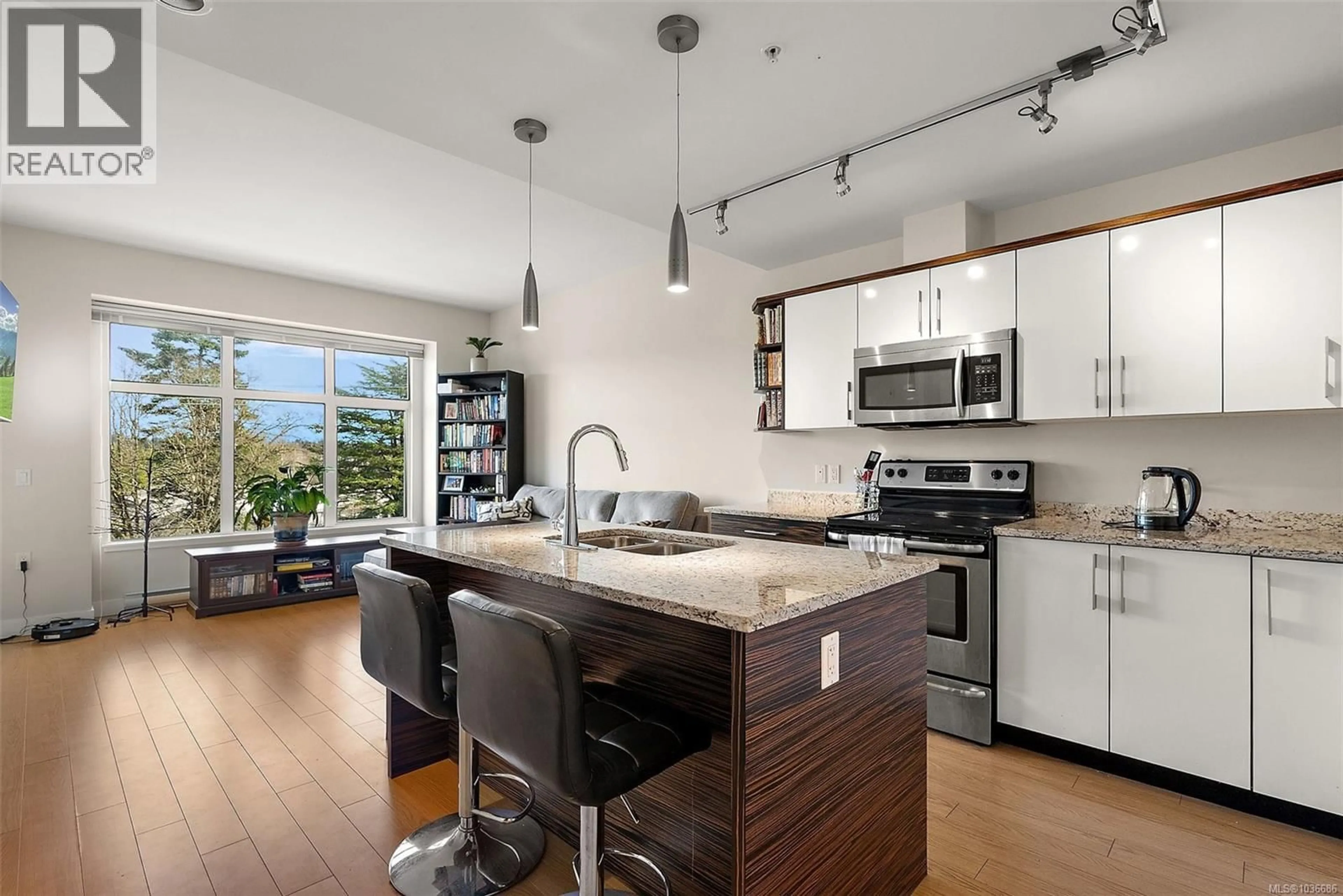 Open concept kitchen, unknown for 405 - 4040 BORDEN STREET, Saanich British Columbia V8X2E9