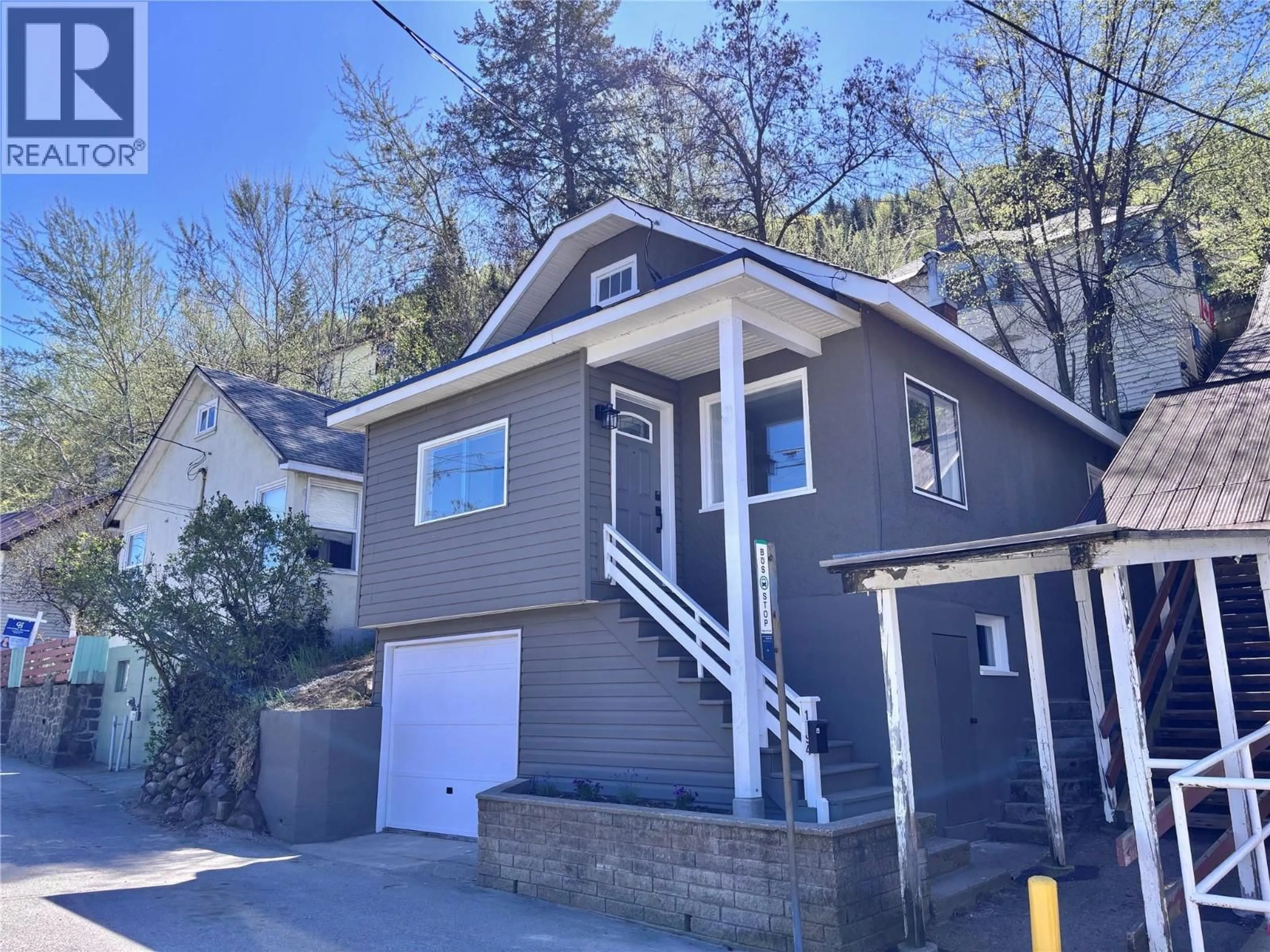 Home with vinyl exterior material, street for 1994 TOPPING STREET, Trail British Columbia V1R4G5