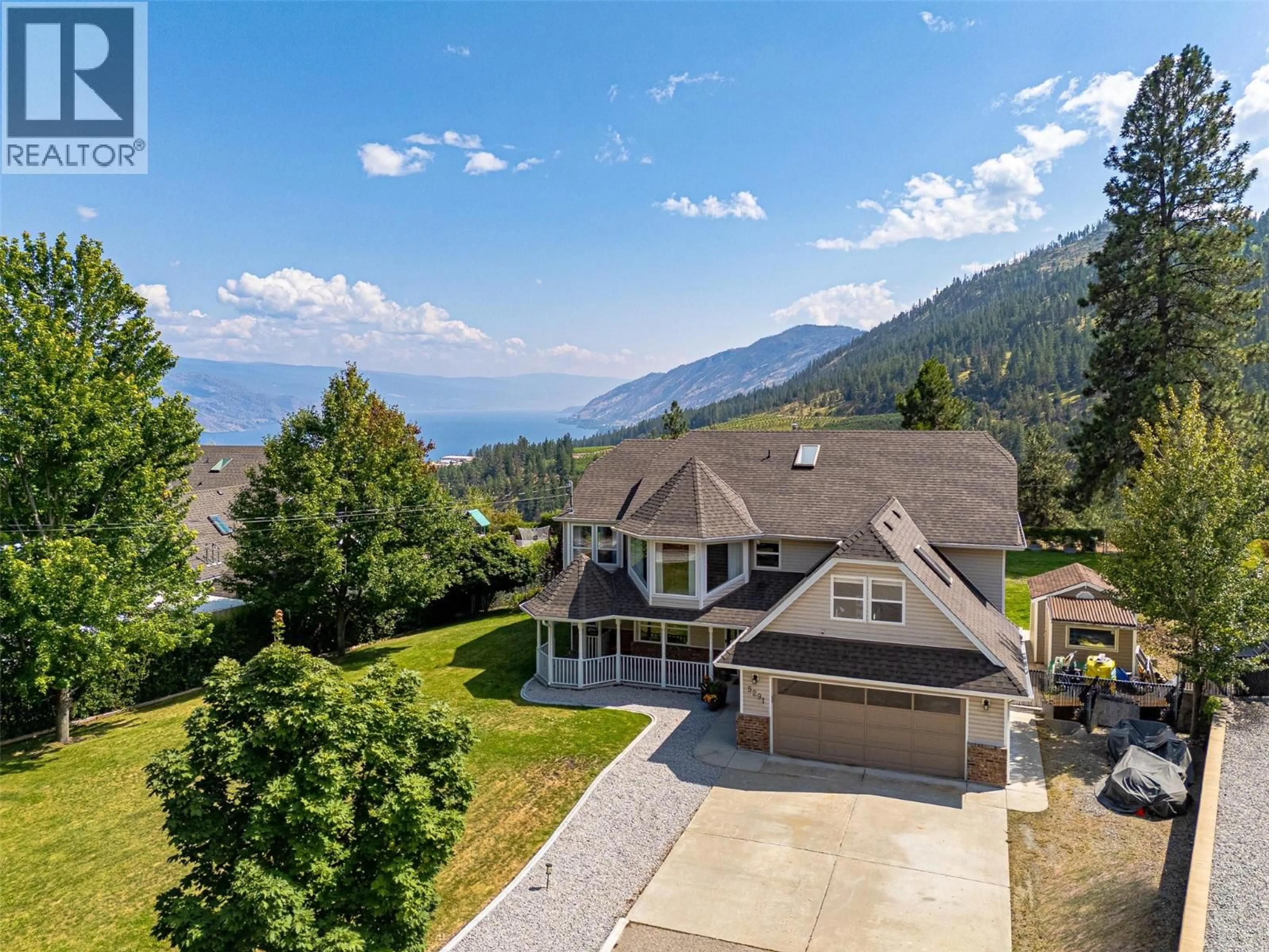 A pic from outside/outdoor area/front of a property/back of a property/a pic from drone, mountain view for 5291 BRADBURY STREET, Peachland British Columbia V0H1X8