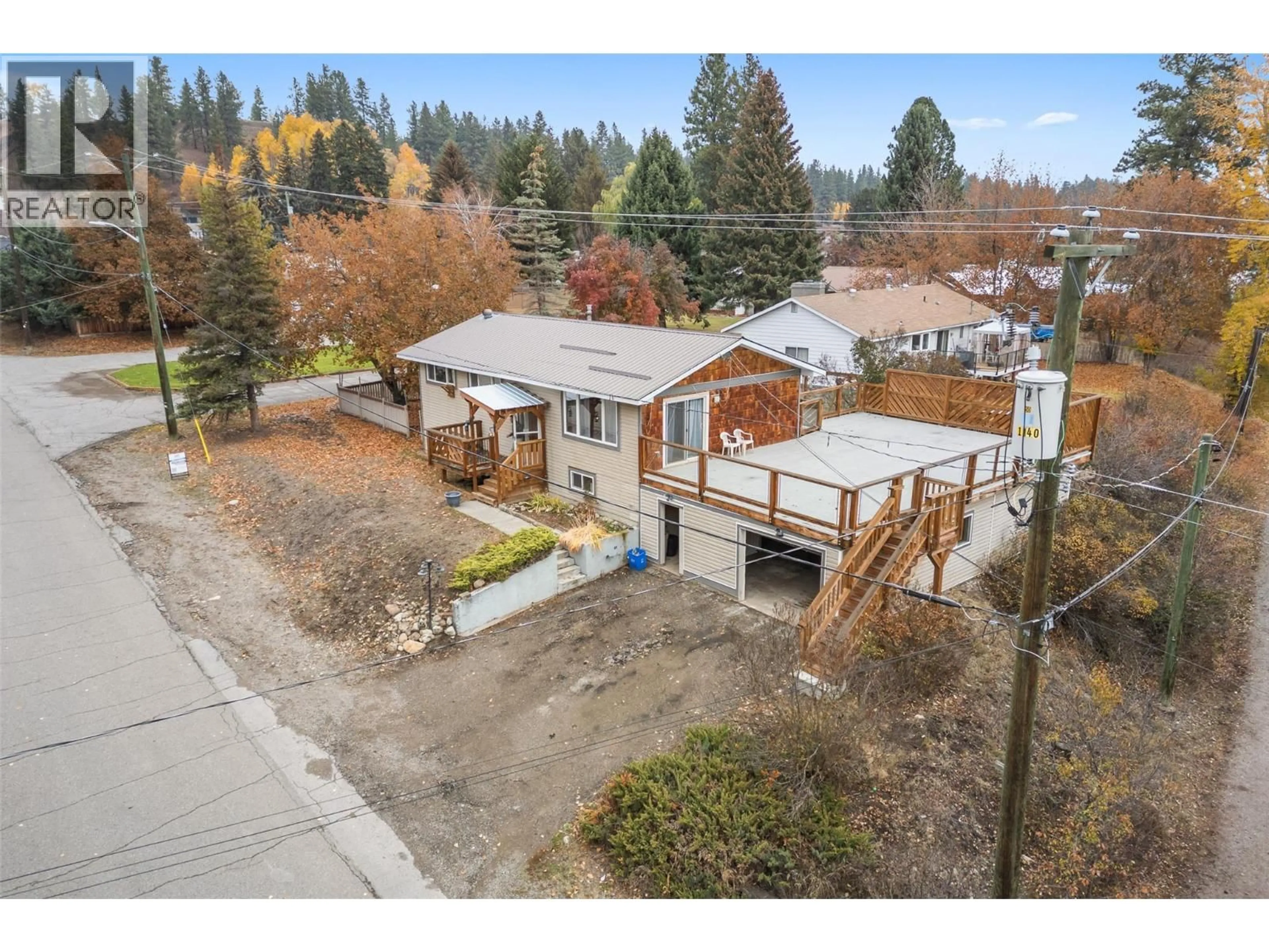 A pic from outside/outdoor area/front of a property/back of a property/a pic from drone, street for 335 NECHIEFMAN STREET, Princeton British Columbia V0X1W0