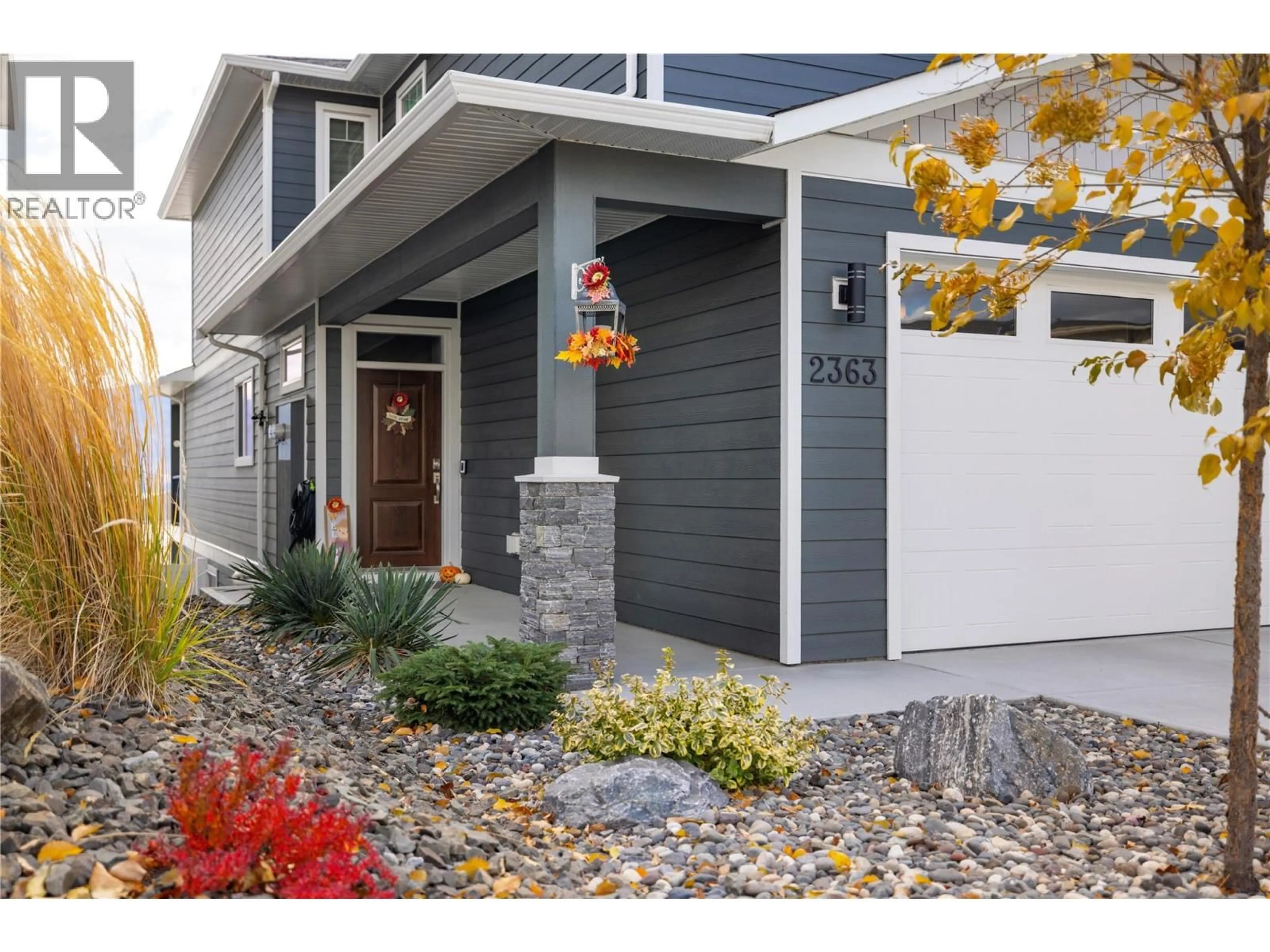 Home with vinyl exterior material, street for 2363 HAWKS BOULEVARD, West Kelowna British Columbia V4T0A7