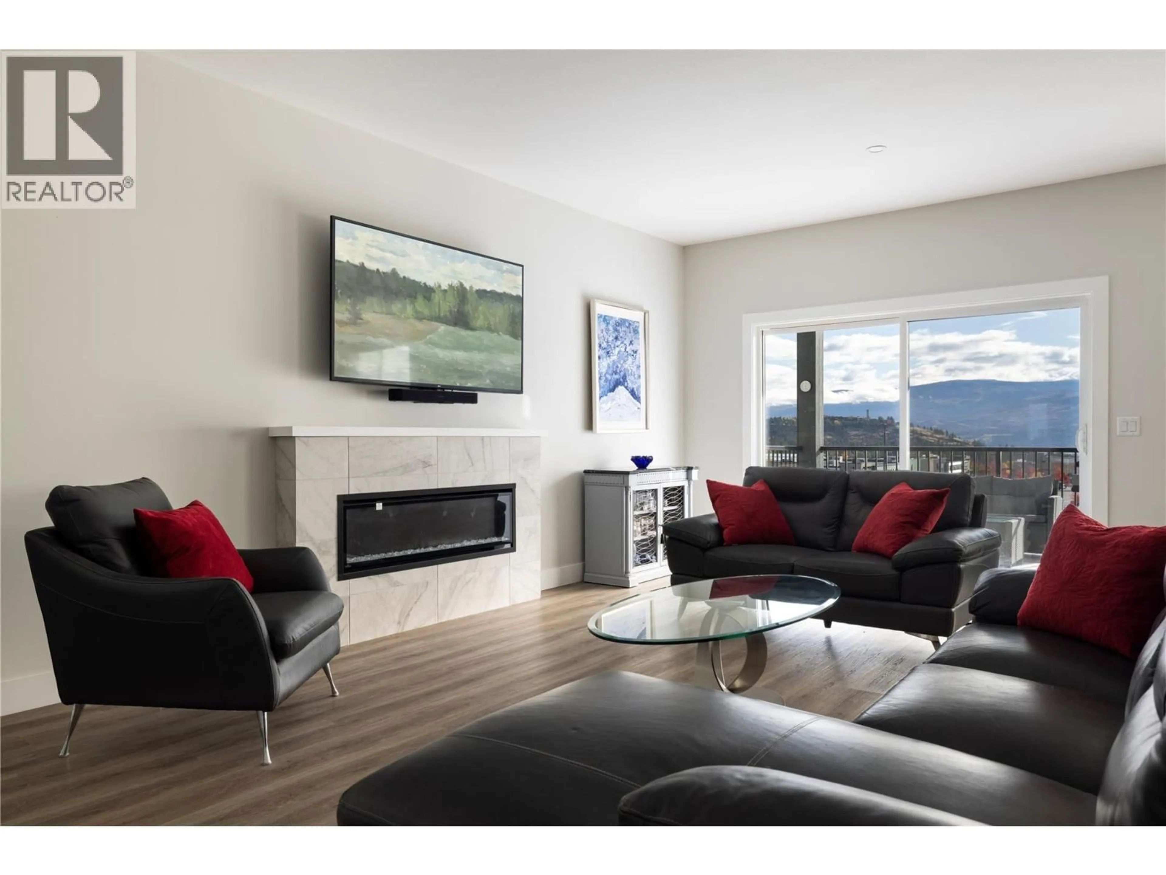 Living room with furniture, wood/laminate floor for 2363 HAWKS BOULEVARD, West Kelowna British Columbia V4T0A7
