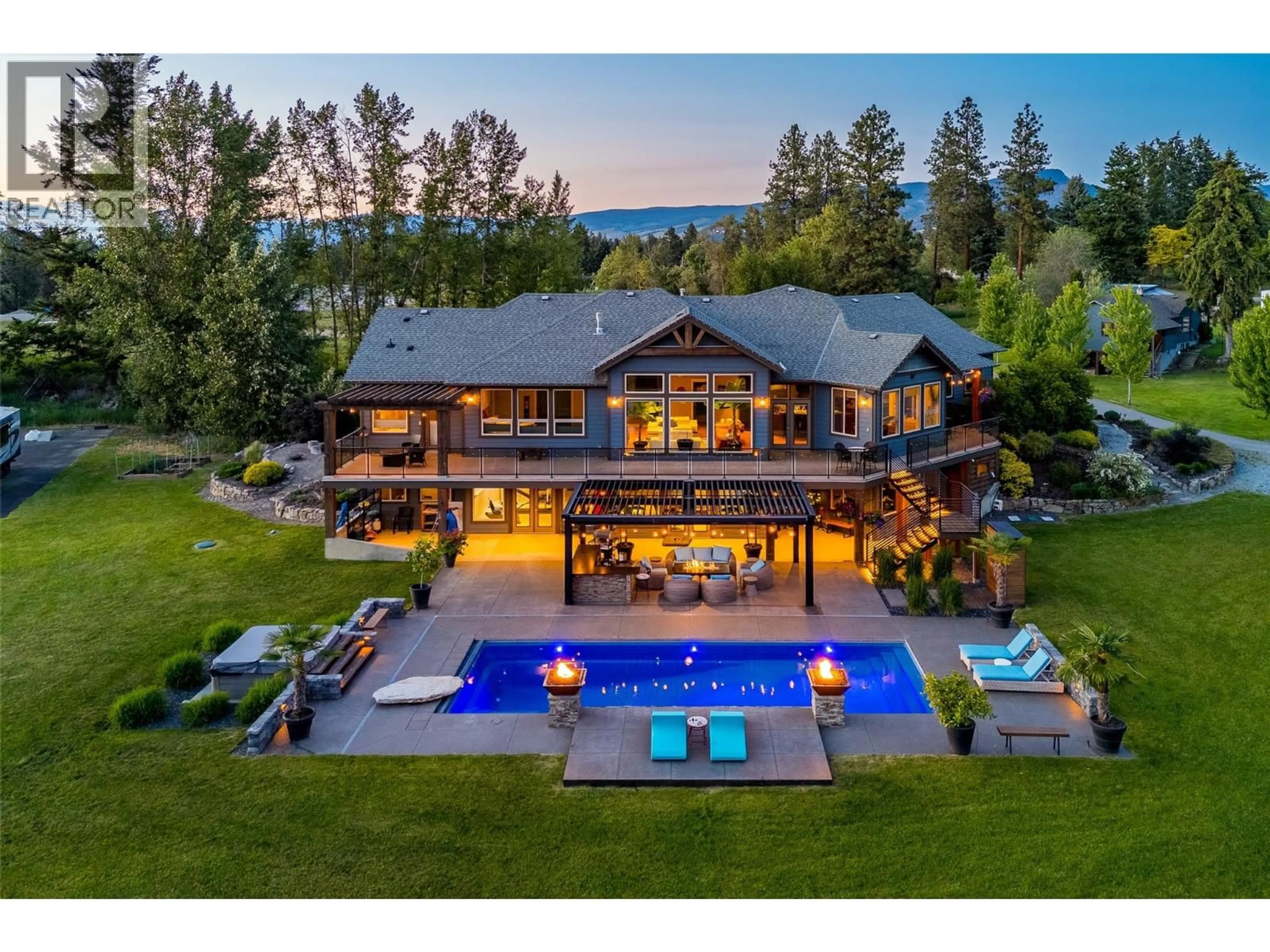 A pic from outside/outdoor area/front of a property/back of a property/a pic from drone, mountain view for 4284 JAUD ROAD, Kelowna British Columbia V1W4C5