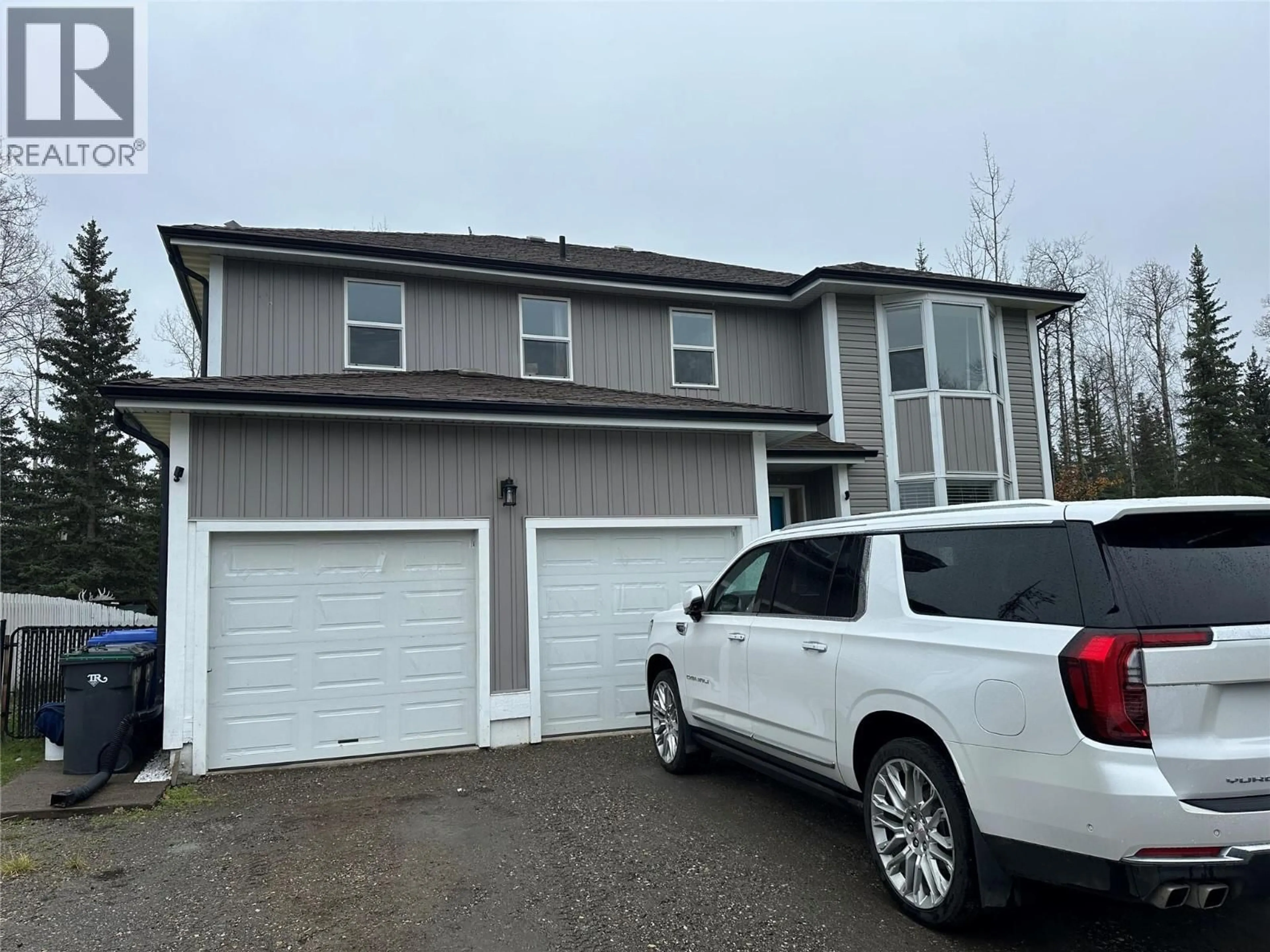 Home with vinyl exterior material, street for 8 SENTINAL PL PLACE, Tumbler Ridge British Columbia V0C2W0