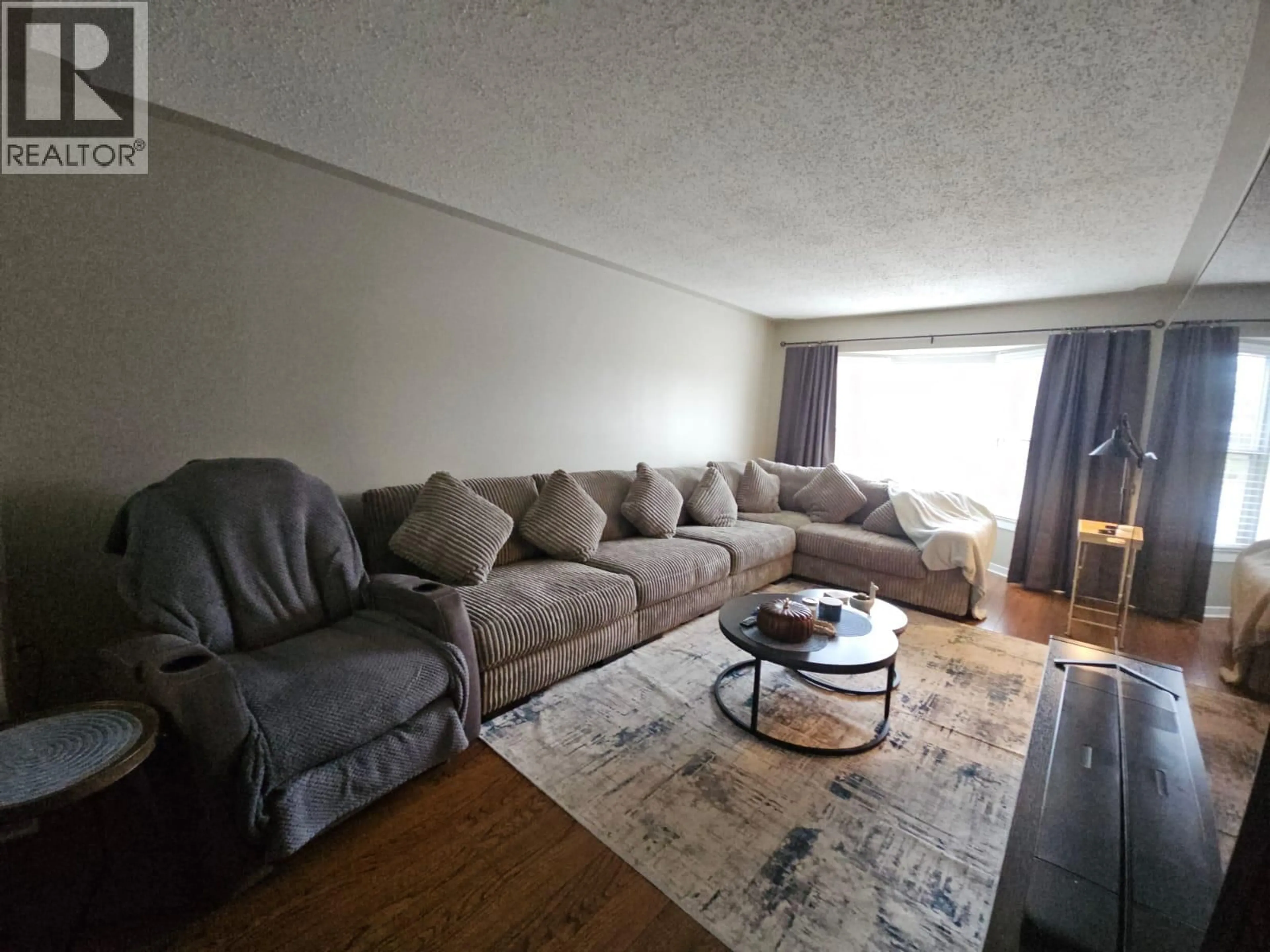 Living room with furniture, unknown for 8 SENTINAL PL PLACE, Tumbler Ridge British Columbia V0C2W0
