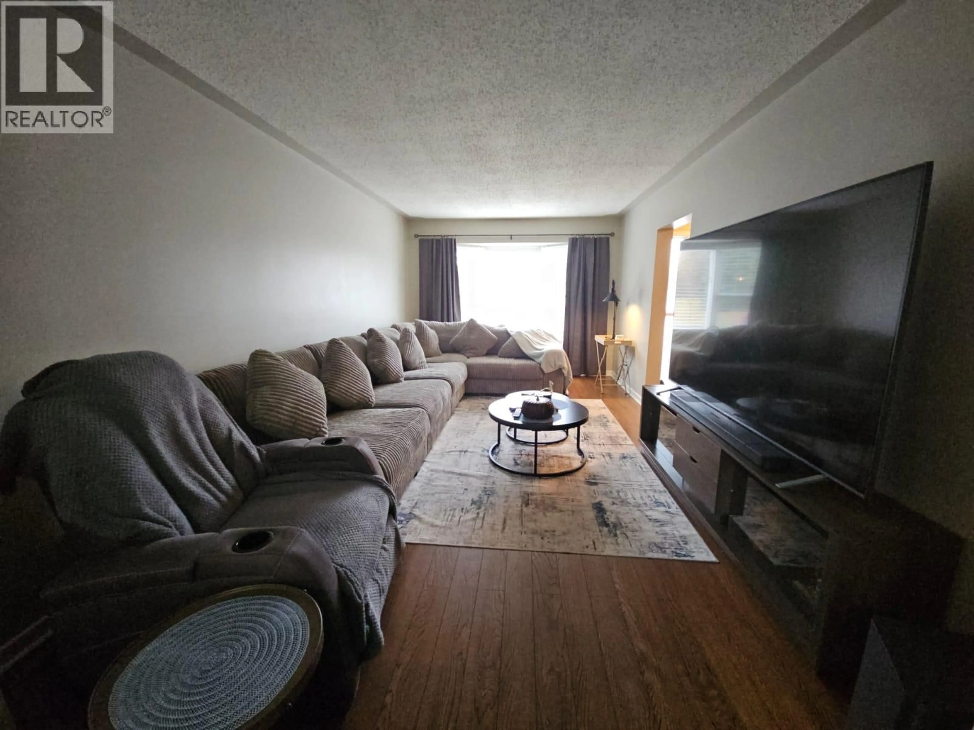 Living room with furniture, unknown for 8 SENTINAL PL PLACE, Tumbler Ridge British Columbia V0C2W0