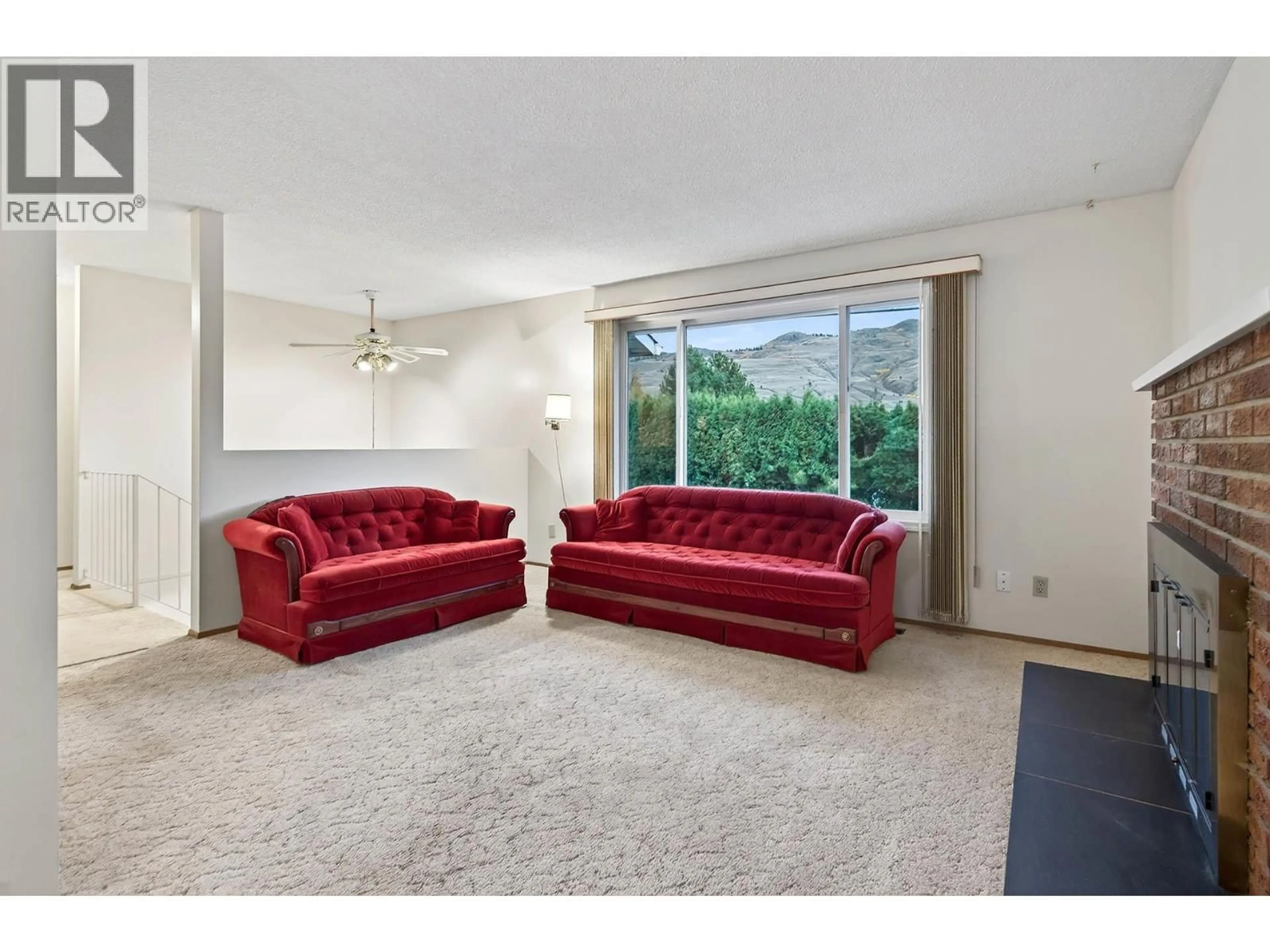 Living room with furniture, carpet floor for 3676 WESTSYDE ROAD, Kamloops British Columbia V2B7H6