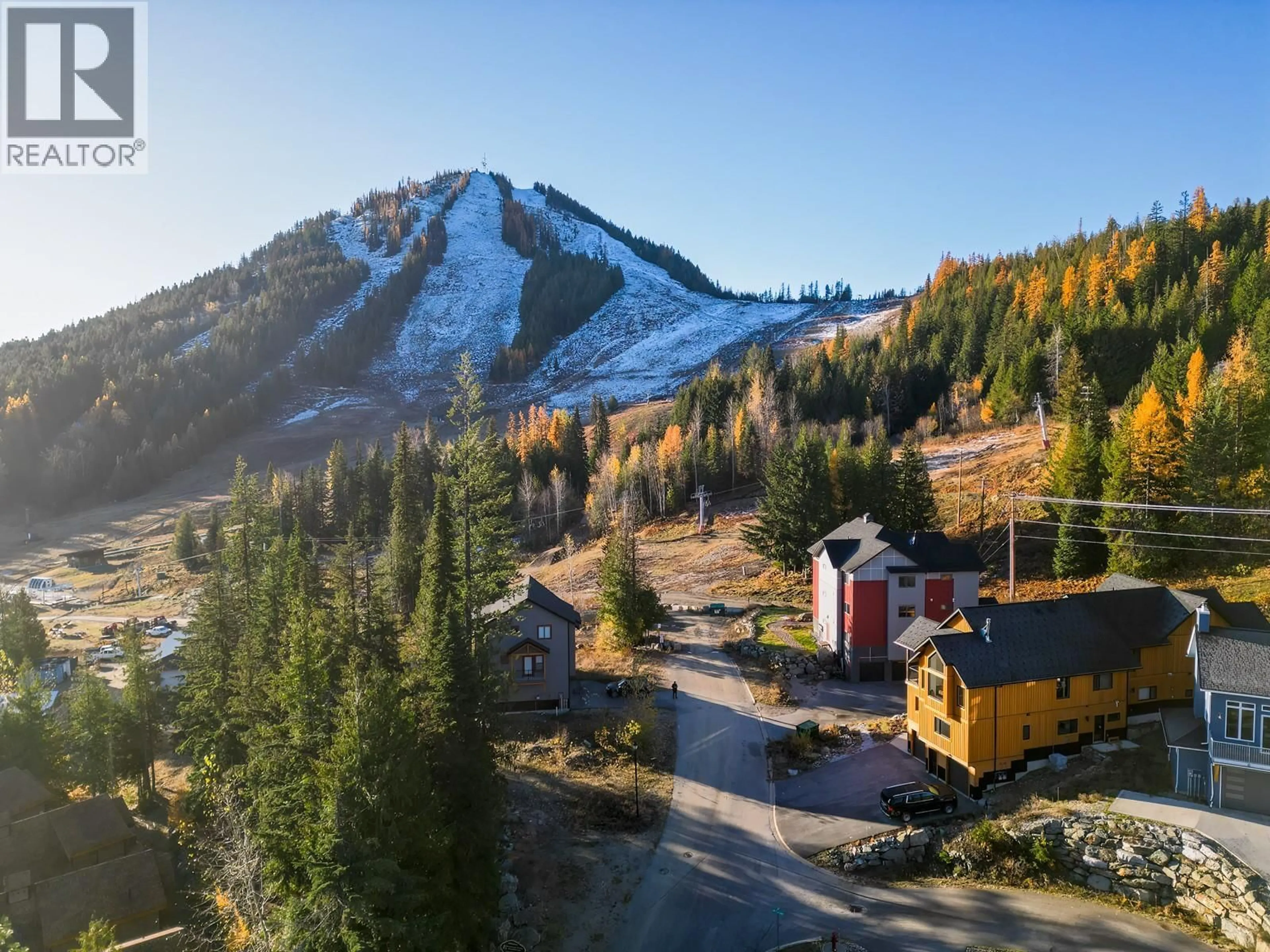 A pic from outside/outdoor area/front of a property/back of a property/a pic from drone, mountain view for B - 2001 CREST ROAD, Rossland British Columbia V0G1Y0