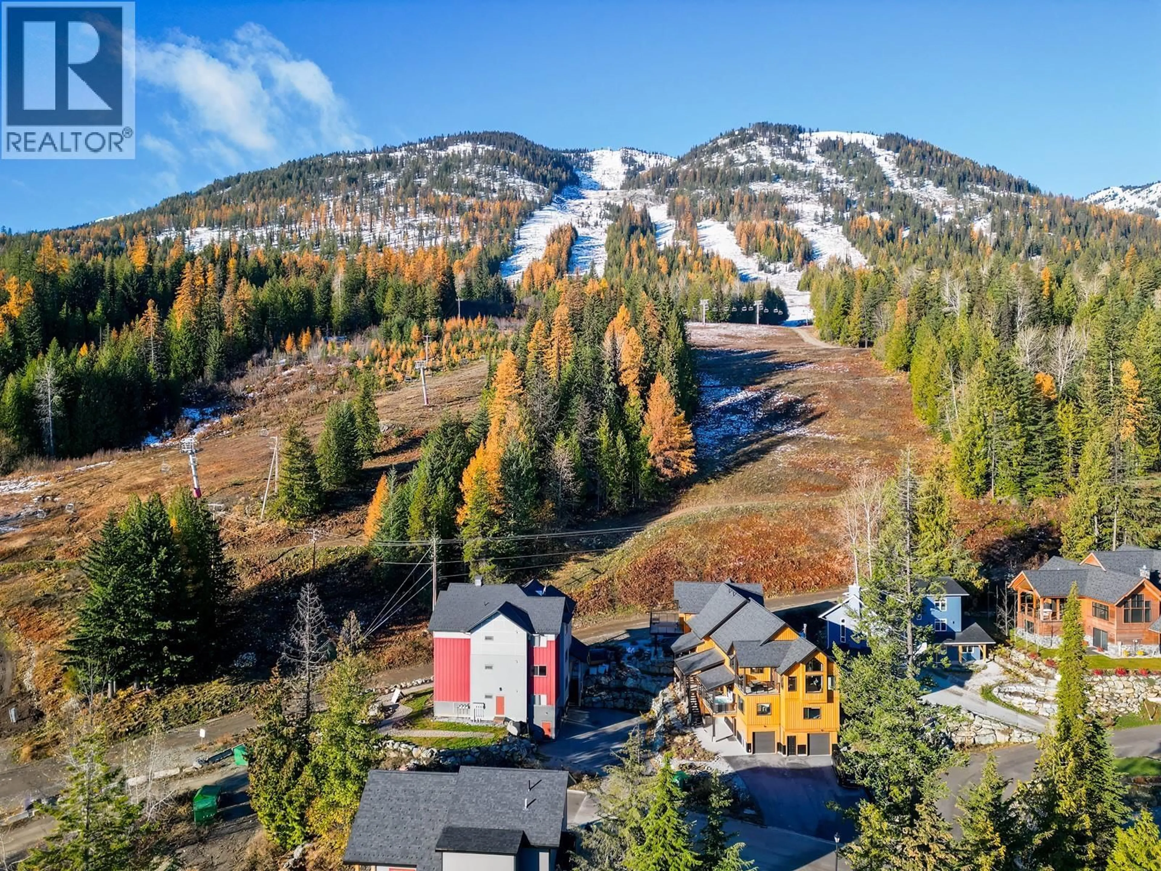 A pic from outside/outdoor area/front of a property/back of a property/a pic from drone, mountain view for B - 2001 CREST ROAD, Rossland British Columbia V0G1Y0