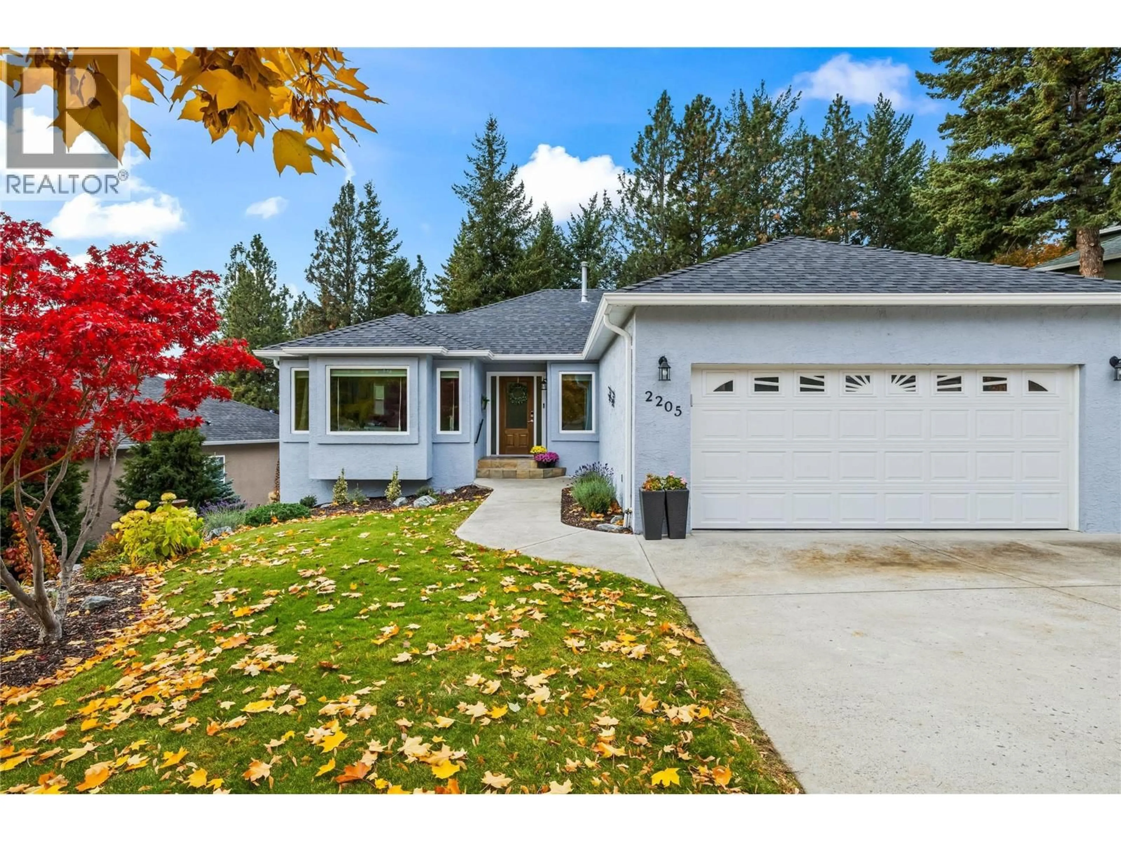 Home with vinyl exterior material, street for 2205 SHANNON WOODS PLACE, West Kelowna British Columbia V4T2L9
