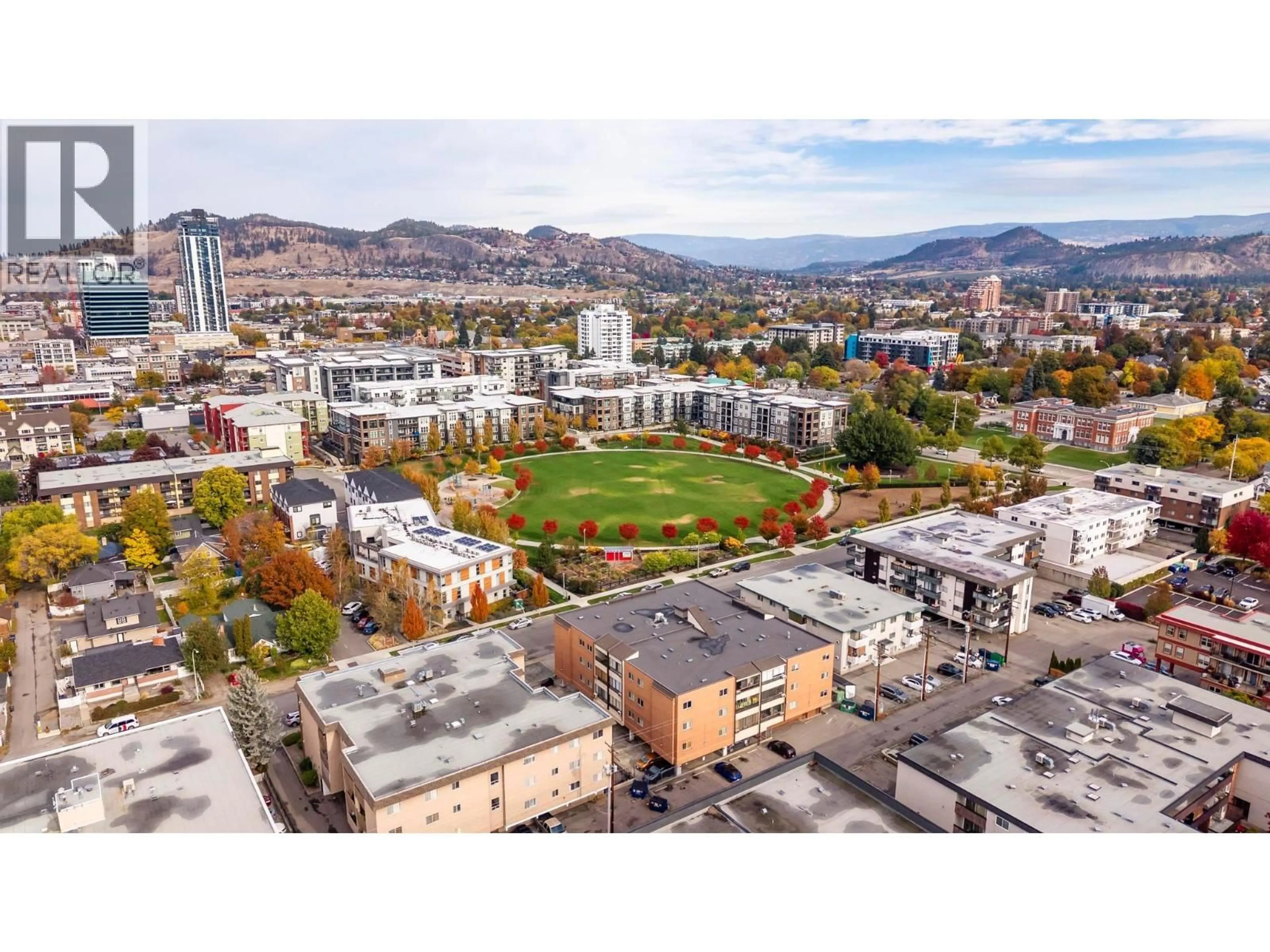 A pic from outside/outdoor area/front of a property/back of a property/a pic from drone, mountain view for 403 - 555 ROWCLIFFE AVENUE, Kelowna British Columbia V1Y5Y8