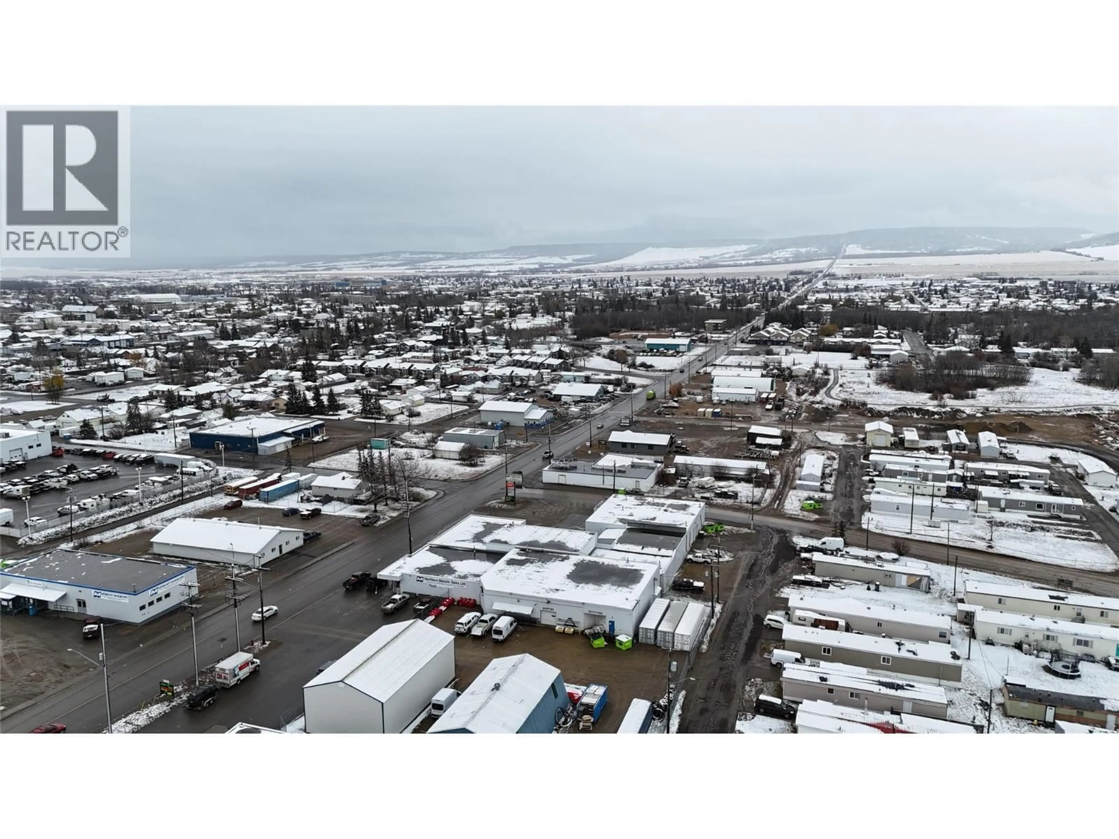 A pic from outside/outdoor area/front of a property/back of a property/a pic from drone, mountain view for 36 - 9700 18 STREET, Dawson Creek British Columbia V1G5A4