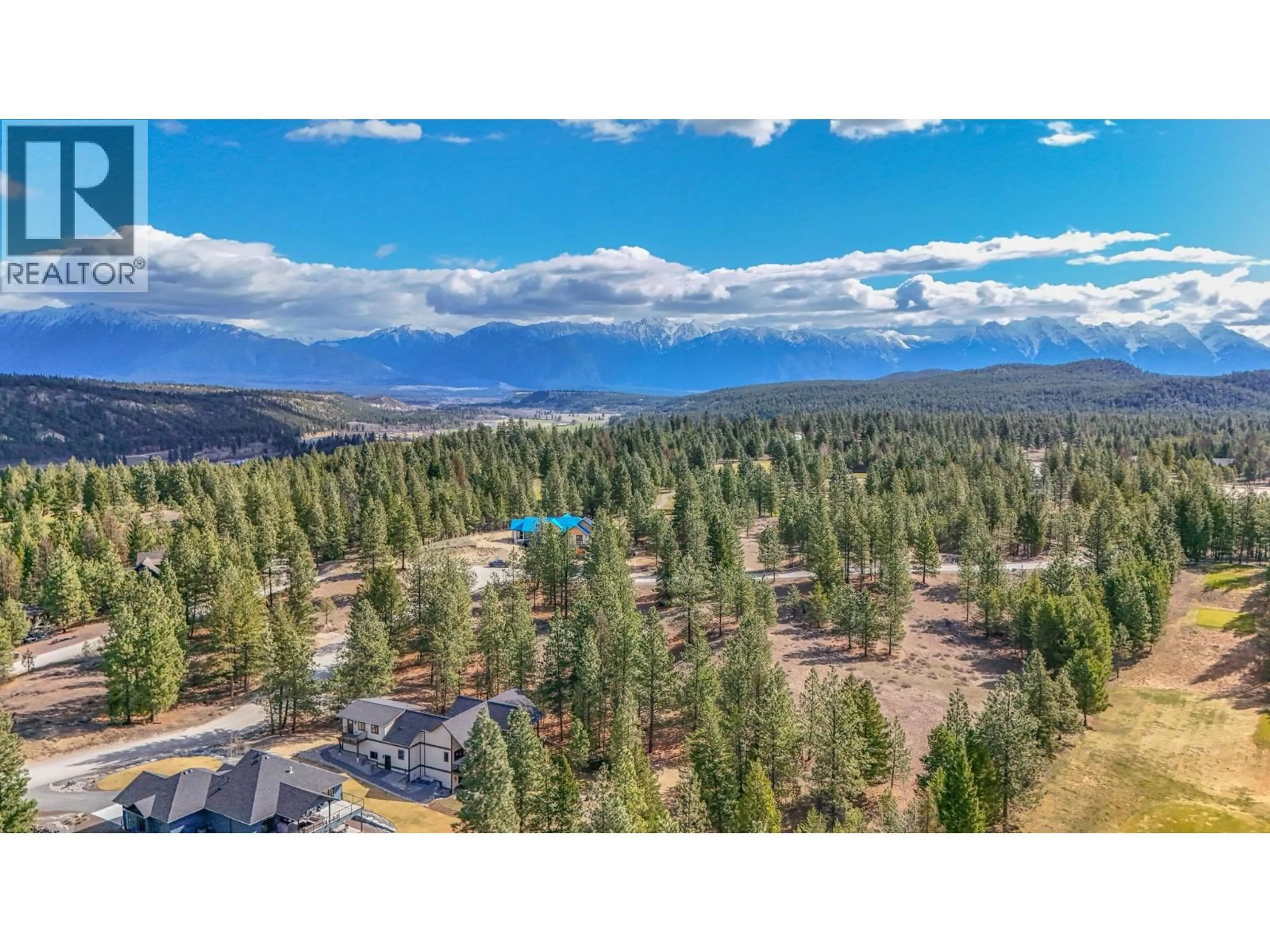 A pic from outside/outdoor area/front of a property/back of a property/a pic from drone, forest/trees view for 208 CORRAL BOULEVARD, Cranbrook British Columbia V1C0C2