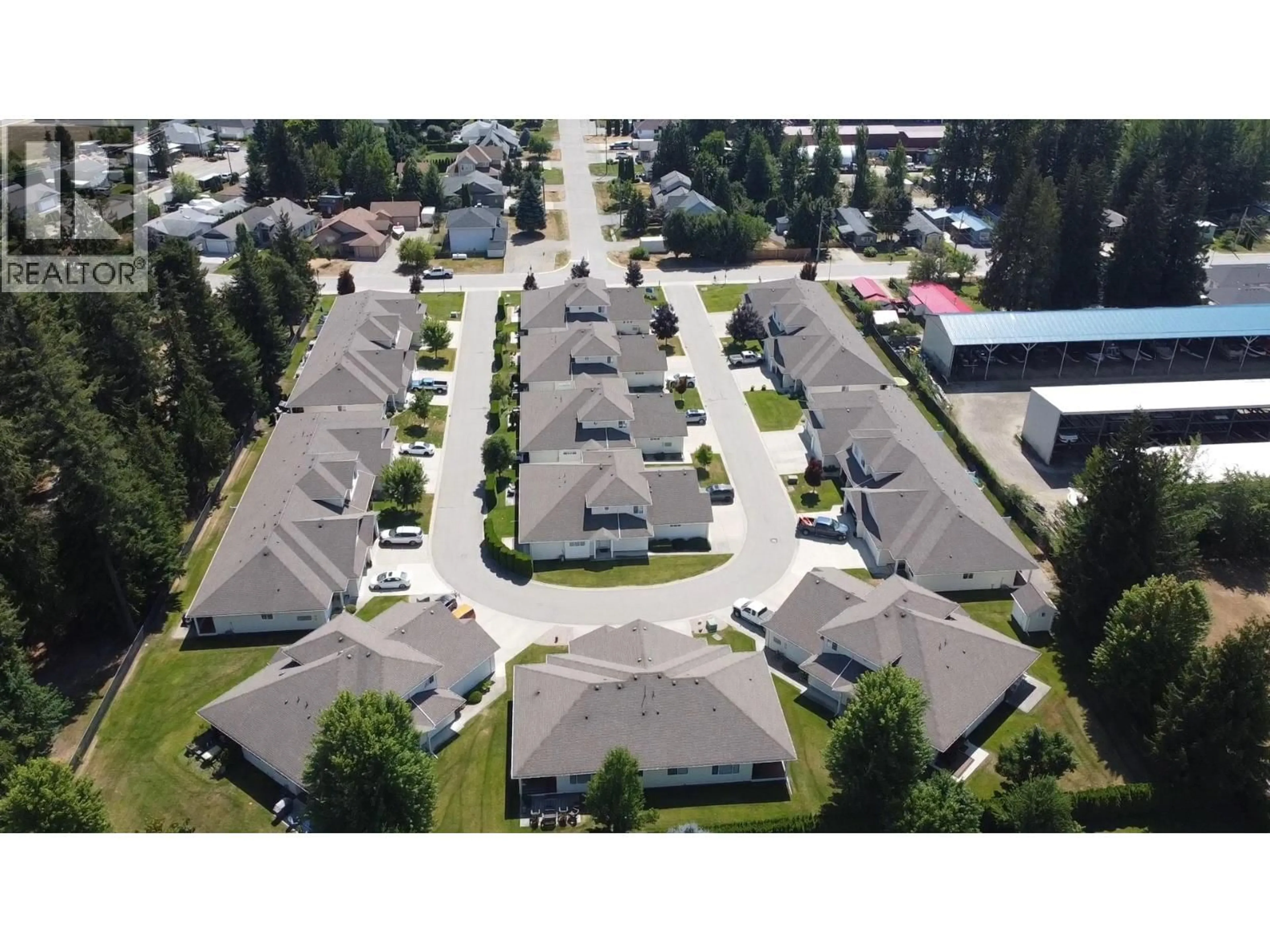 A pic from outside/outdoor area/front of a property/back of a property/a pic from drone, street for 124 - 222 MARTIN STREET, Sicamous British Columbia V0E2V0