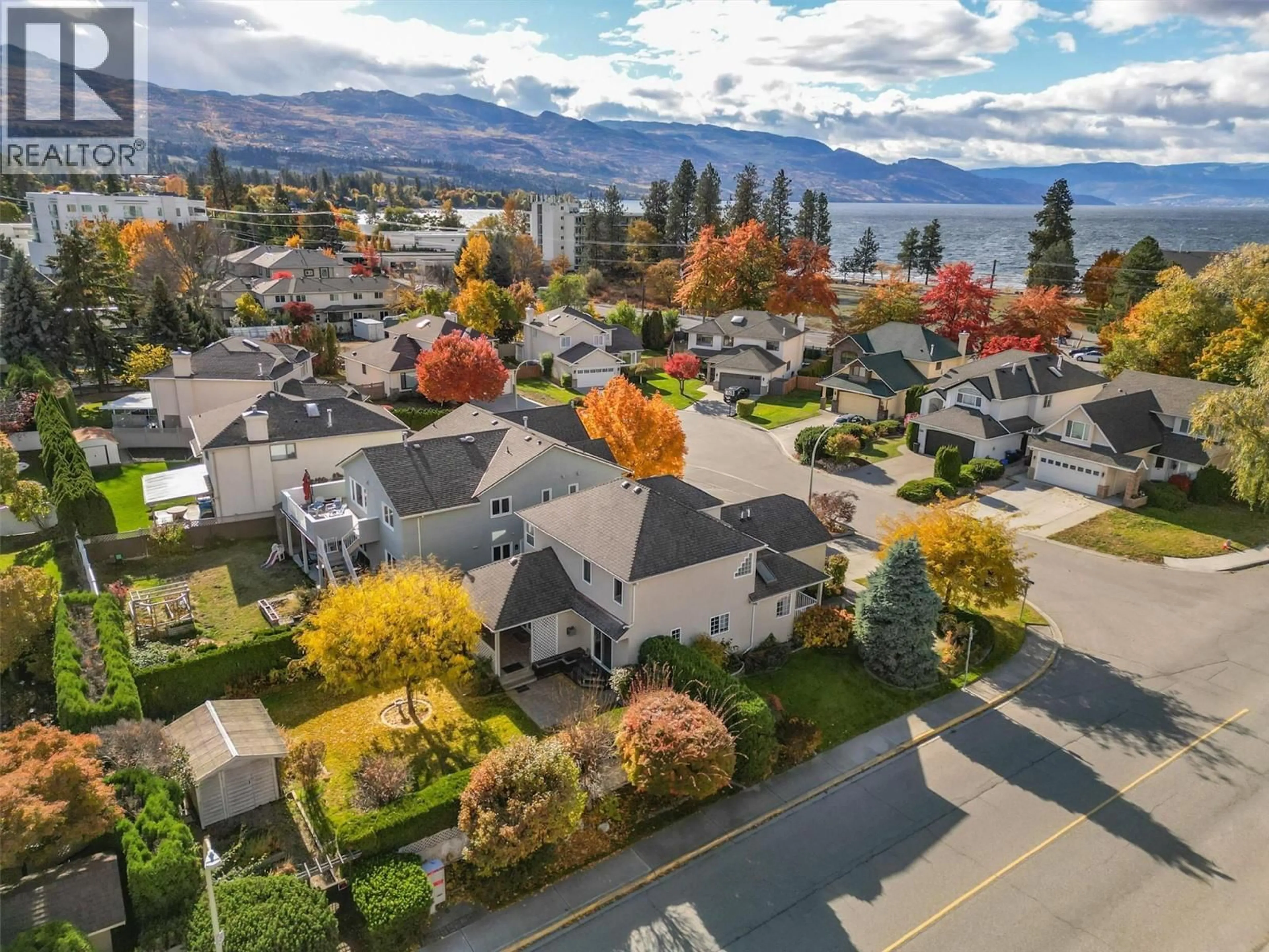 A pic from outside/outdoor area/front of a property/back of a property/a pic from drone, mountain view for 4003 LOGIE COURT, Kelowna British Columbia V1W3Y6