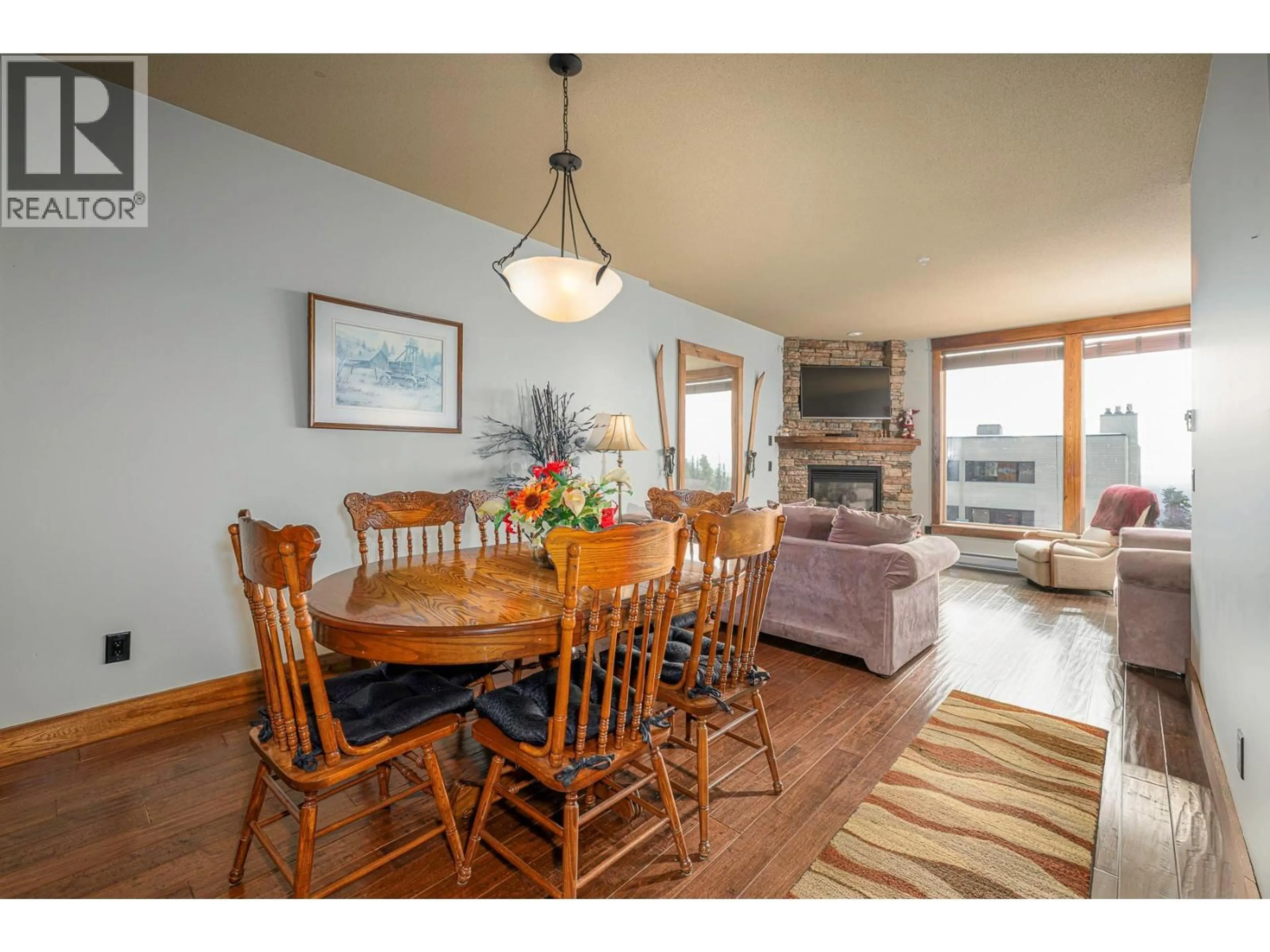 Dining room, wood/laminate floor for 3 - 7360 PORCUPINE ROAD, Big White British Columbia V1P1P3