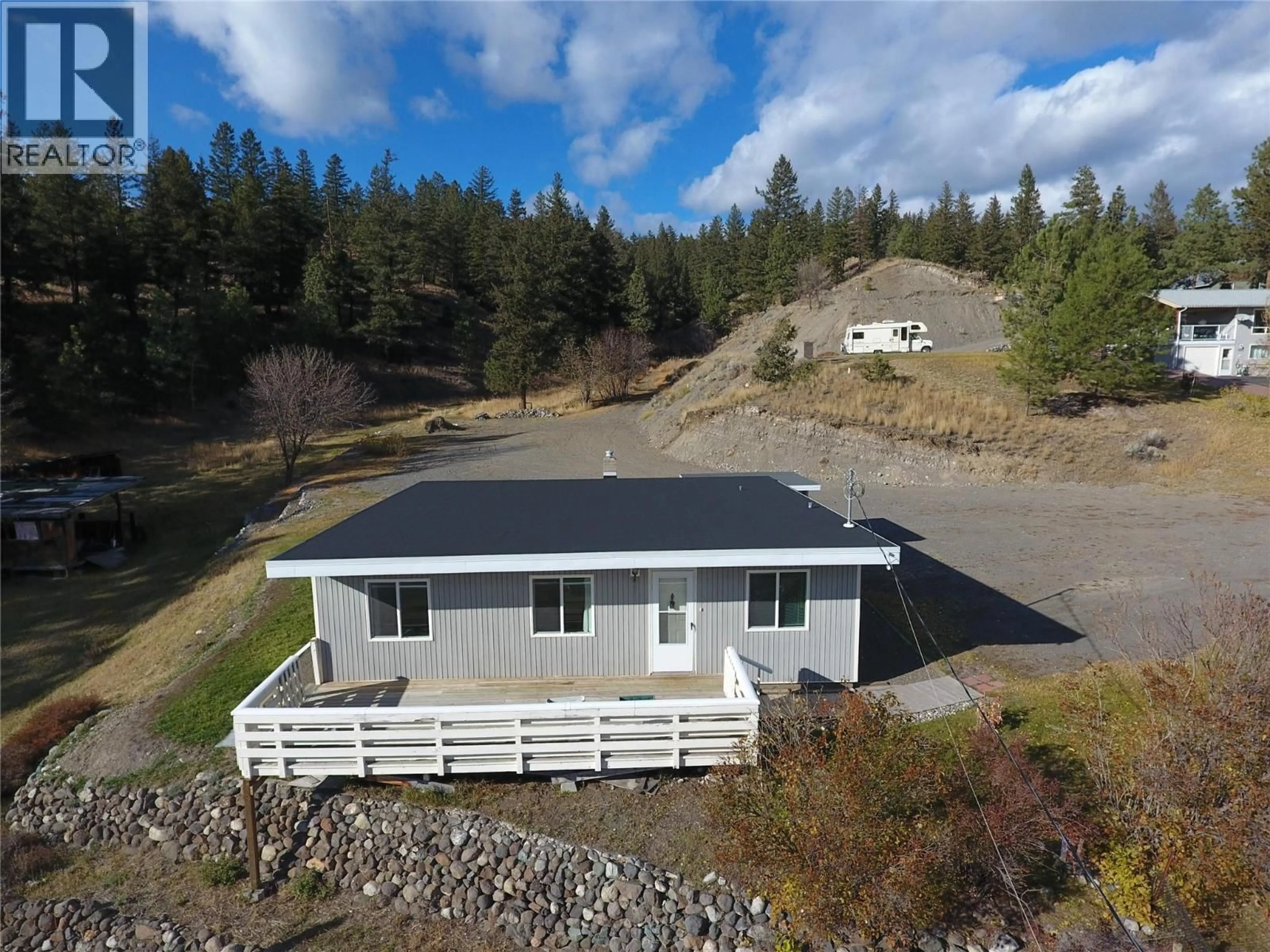 A pic from outside/outdoor area/front of a property/back of a property/a pic from drone, unknown for 409 LEBOURDAIS AVENUE, Clinton British Columbia V0K1K0