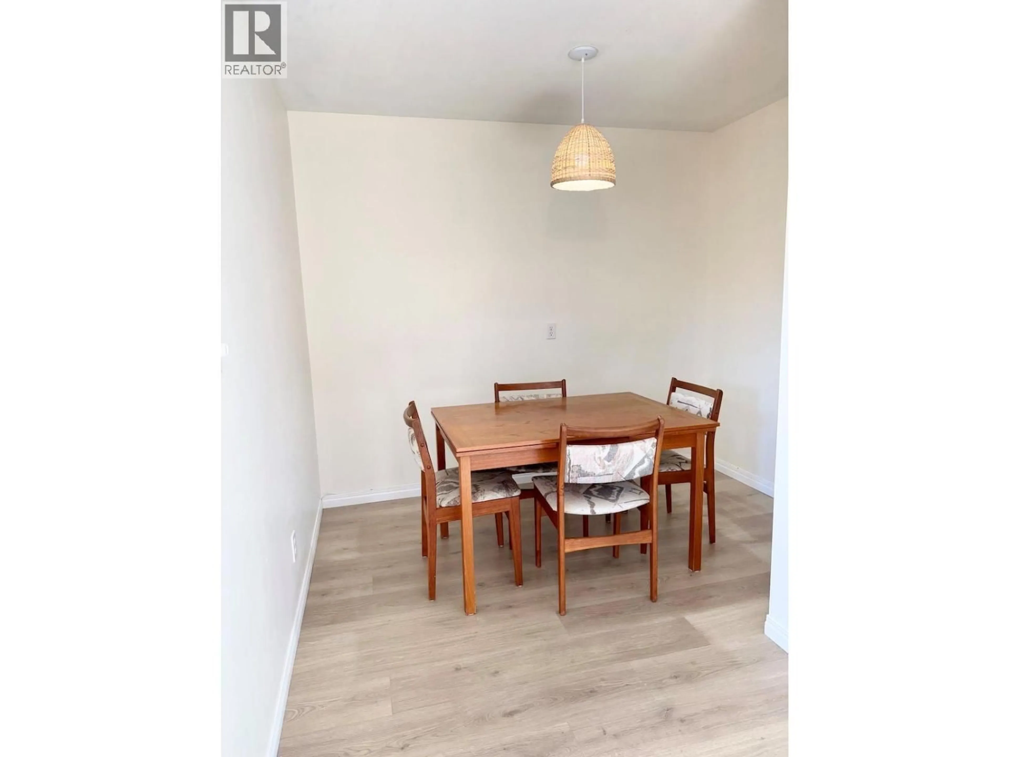 Dining room, wood/laminate floor for 9 - 5877 MAIN STREET, Oliver British Columbia V0H1T0