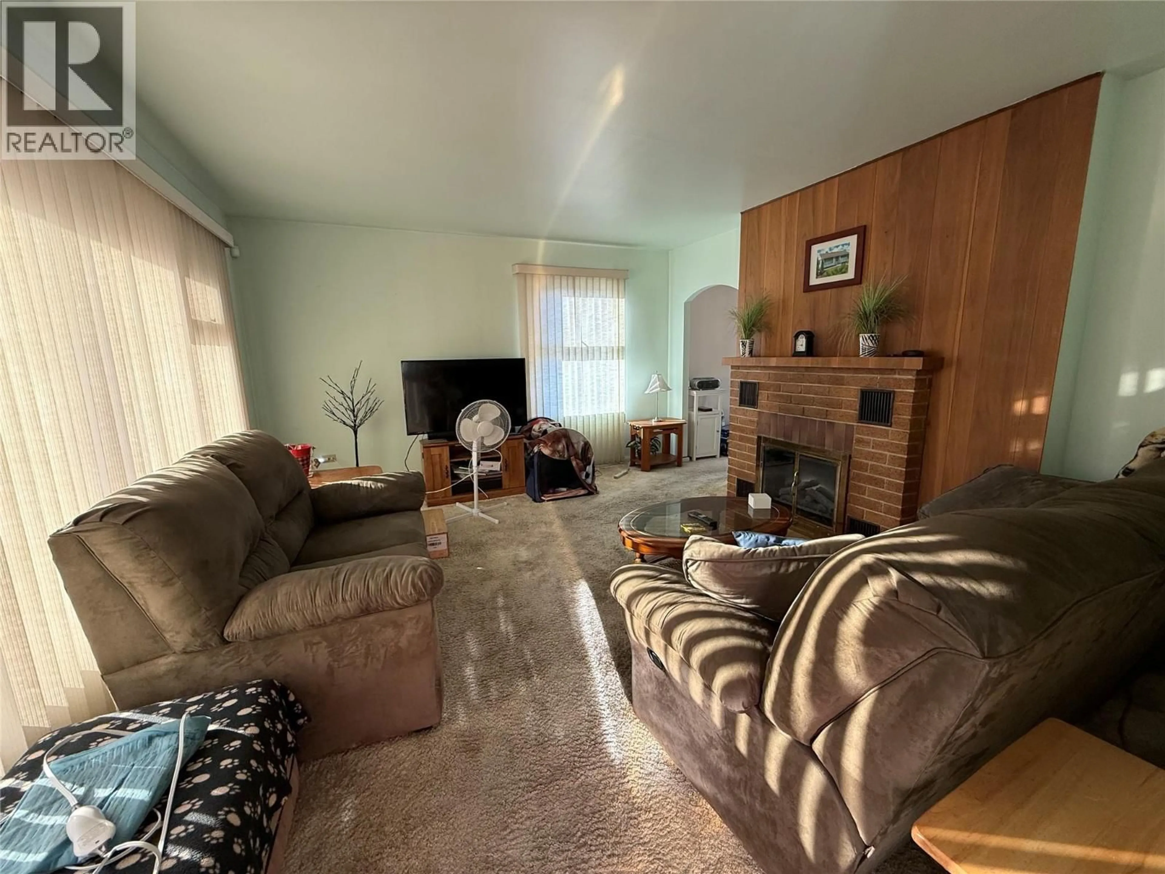 Living room with furniture, unknown for 983 FAIRVIEW ROAD, Penticton British Columbia V2A5Z1