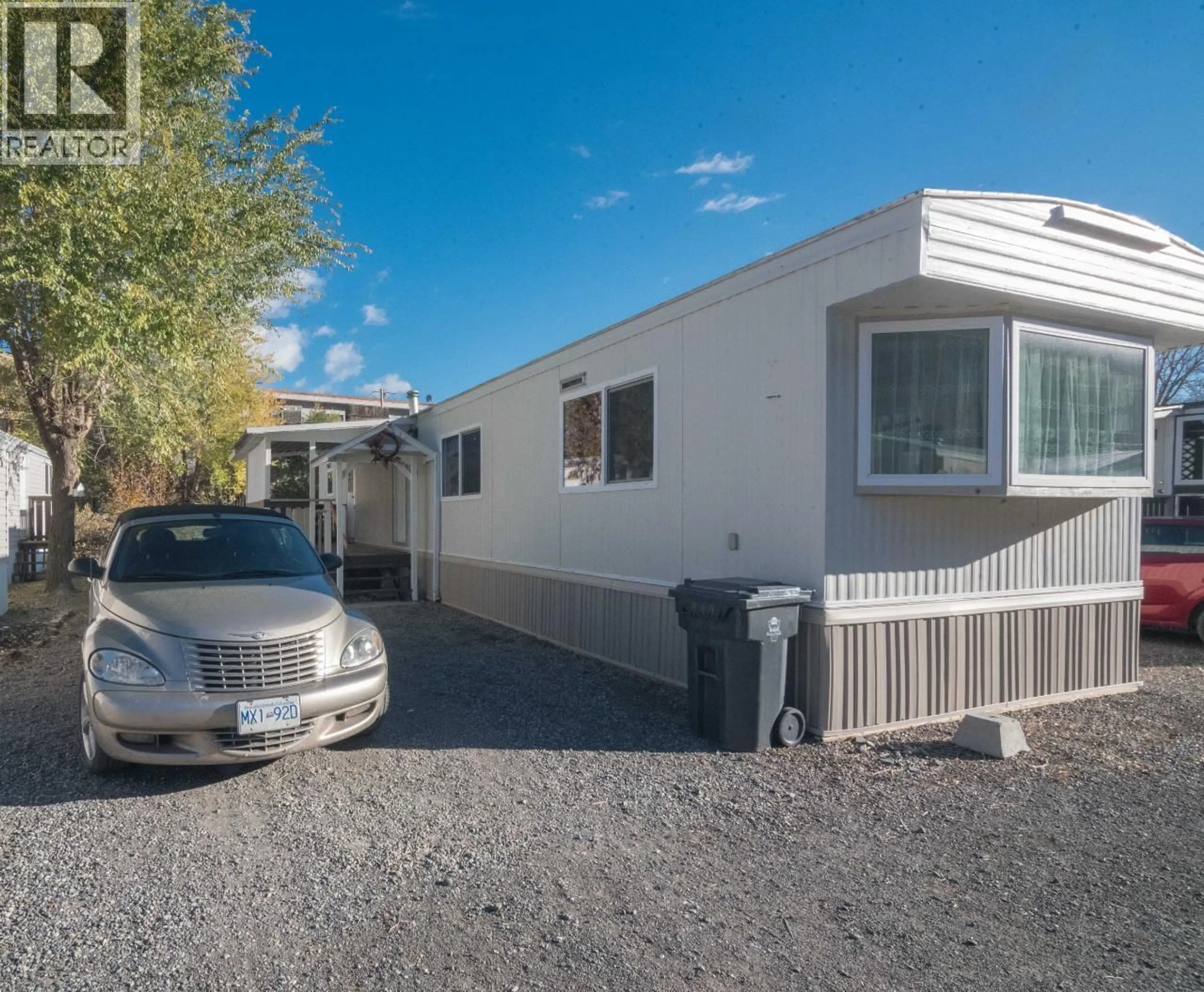 Home with vinyl exterior material, street for 13 - 1055 OLD CARIBOO ROAD, Cache Creek British Columbia V0K1H0