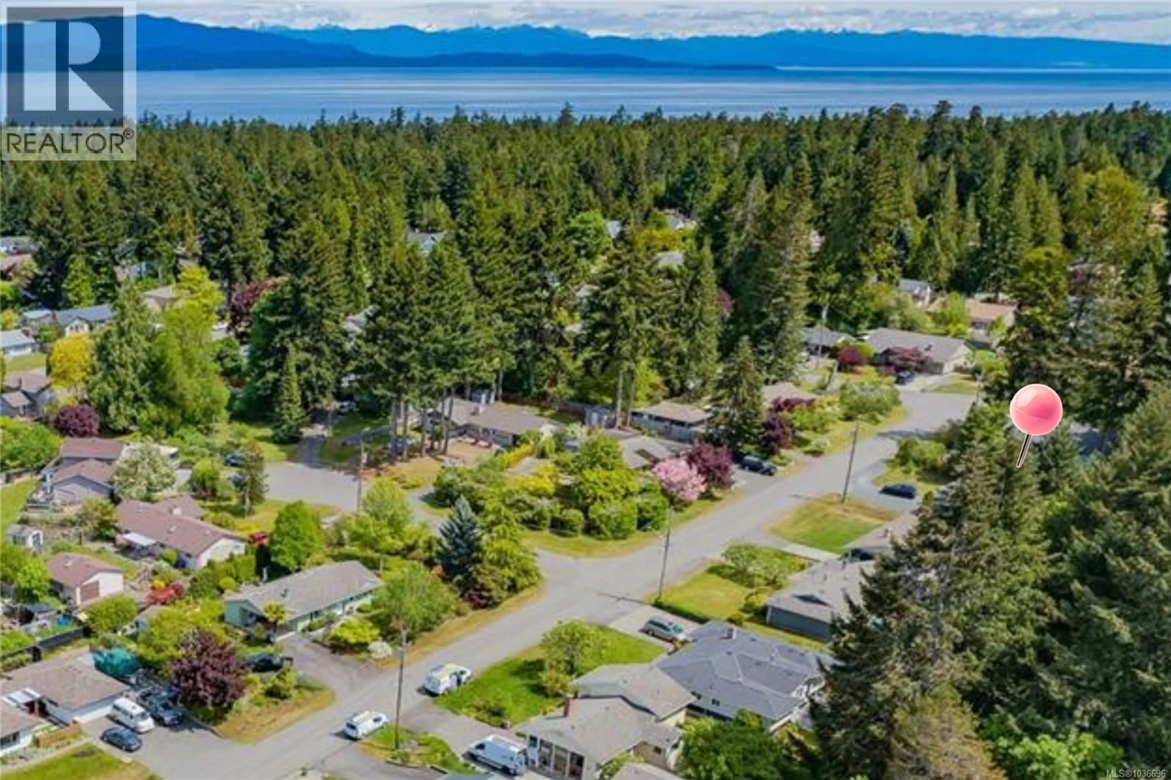 A pic from outside/outdoor area/front of a property/back of a property/a pic from drone, water/lake/river/ocean view for 600 SUMAC DRIVE, Qualicum Beach British Columbia V9K1A8
