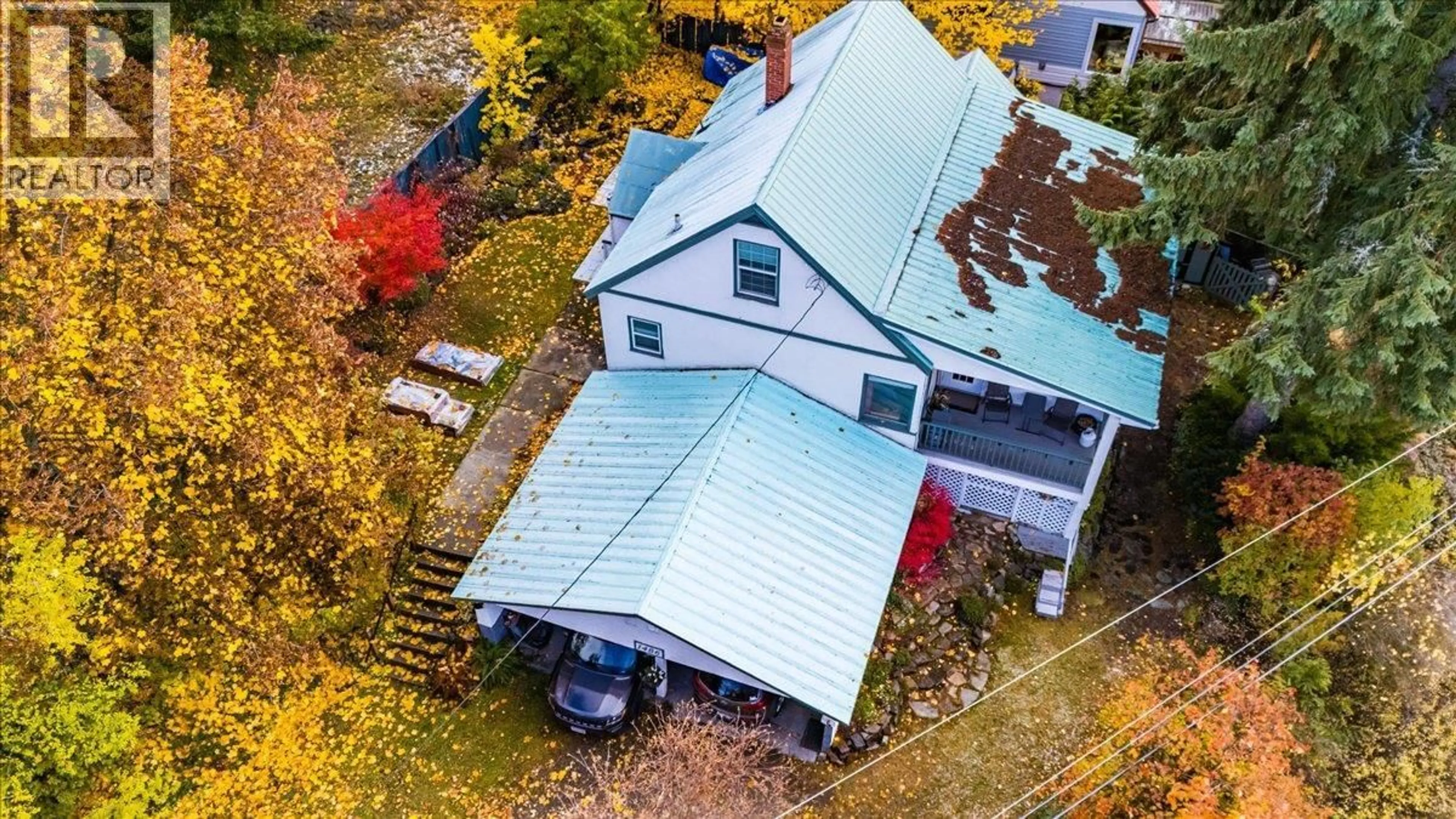 A pic from outside/outdoor area/front of a property/back of a property/a pic from drone, street for 1486 ESLING DRIVE, Rossland British Columbia V0G1Y0