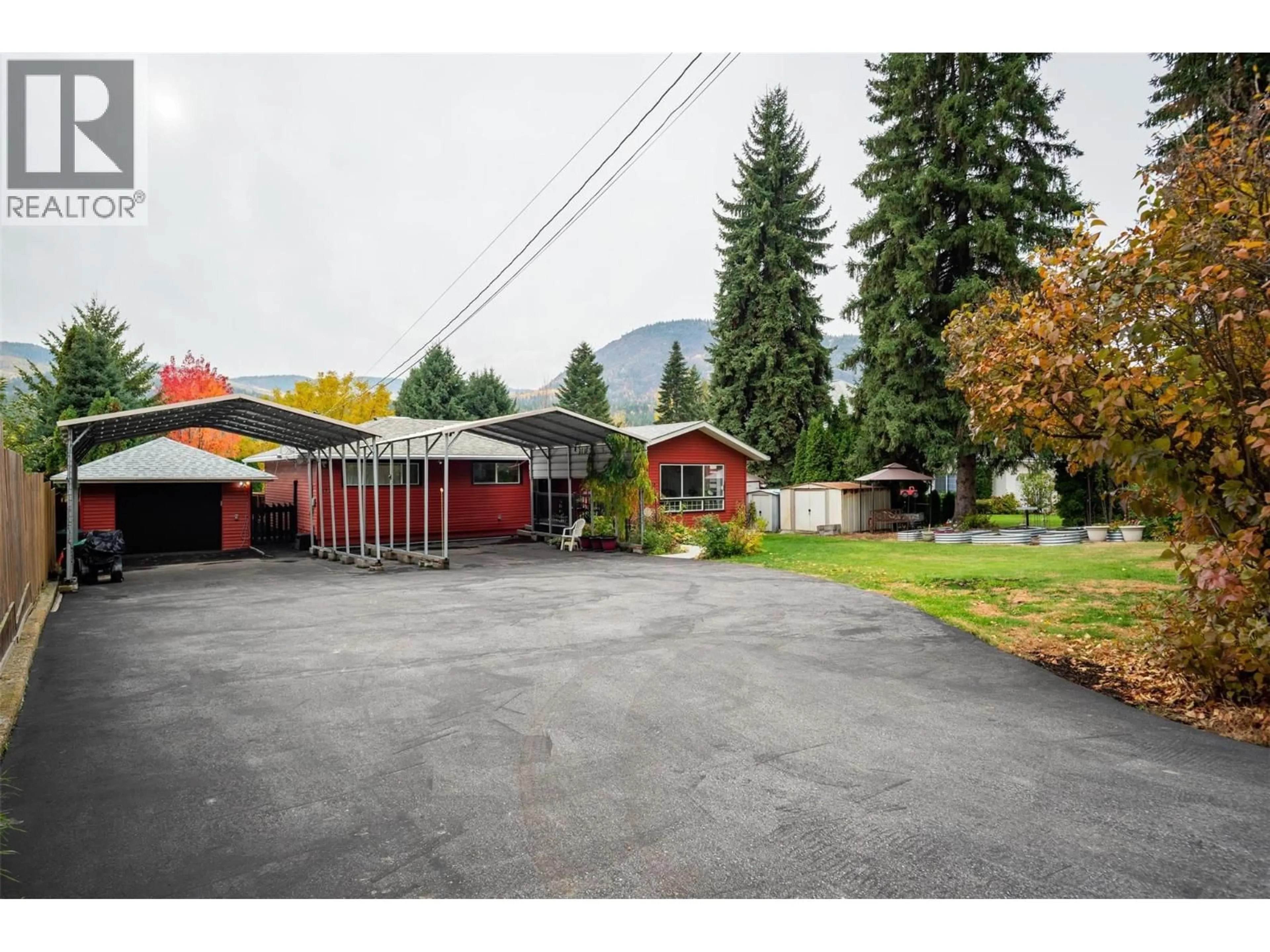 A pic from outside/outdoor area/front of a property/back of a property/a pic from drone, mountain view for 8329 HIGHWAY 3B OTHER, Trail British Columbia V1R4W3