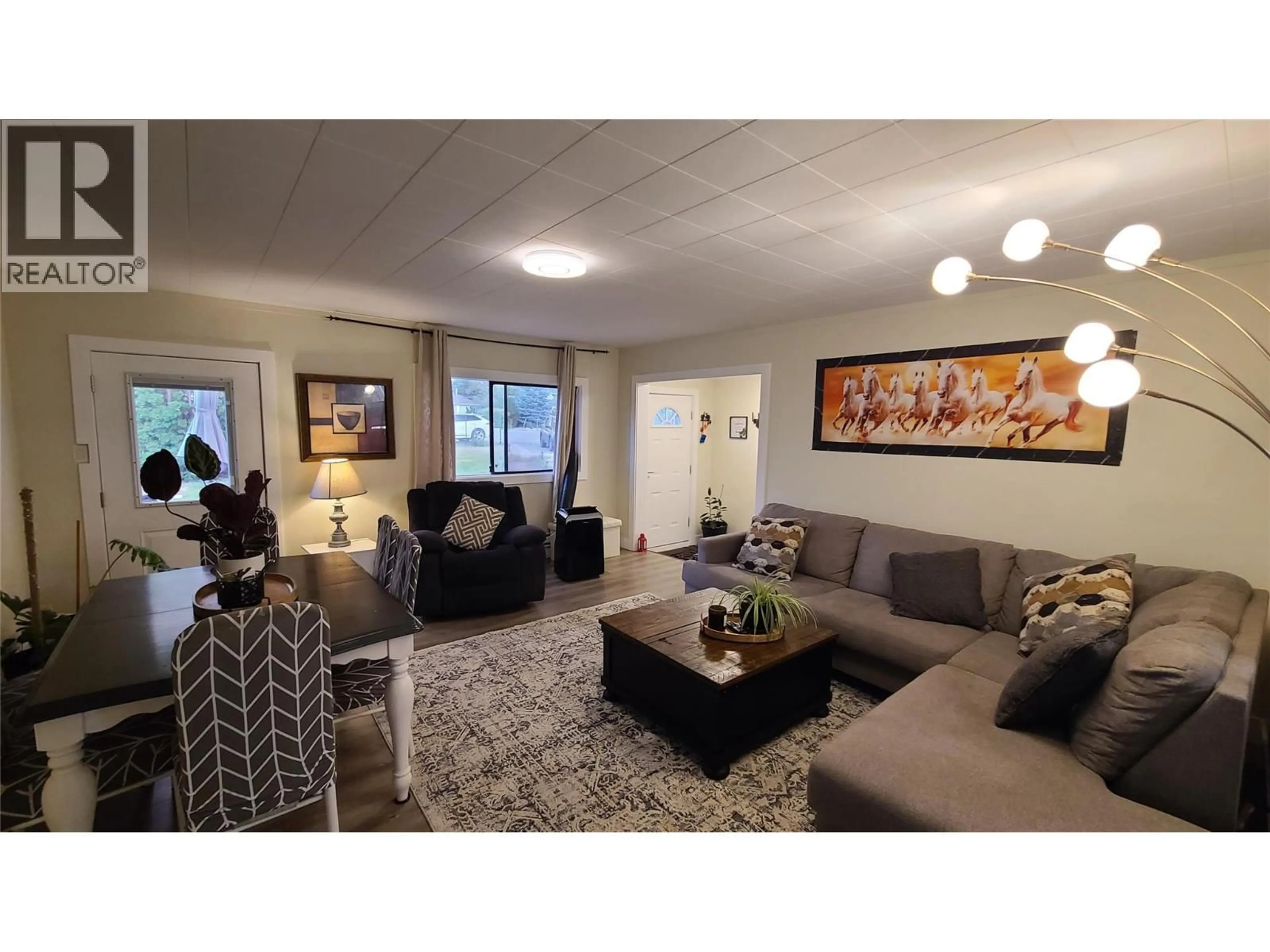 Living room with furniture, unknown for 6488 WOLFCUB PLACE, Oliver British Columbia V0H1T3