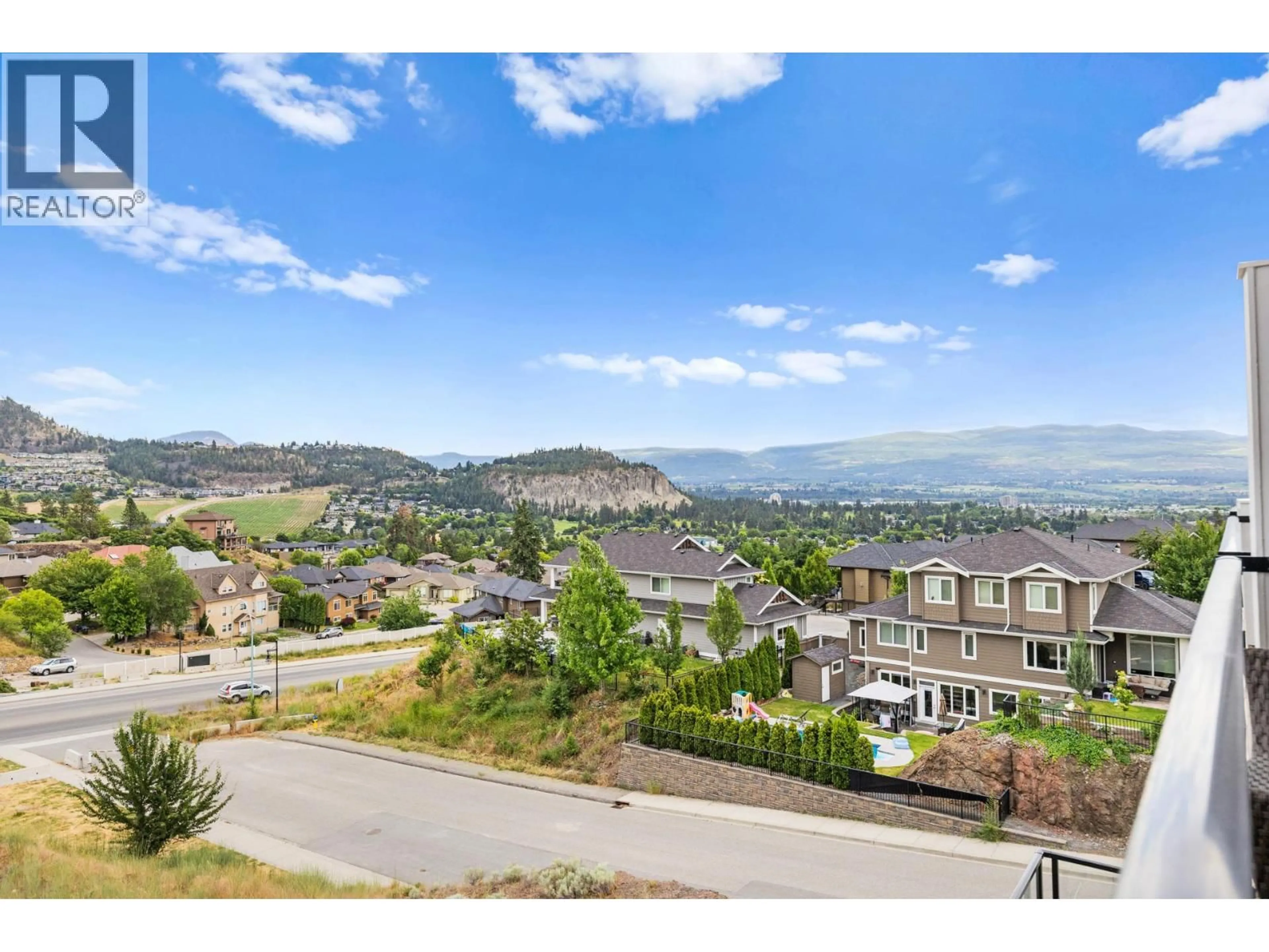 A pic from outside/outdoor area/front of a property/back of a property/a pic from drone, mountain view for 61 - 685 BOYNTON PLACE, Kelowna British Columbia V1V0G7