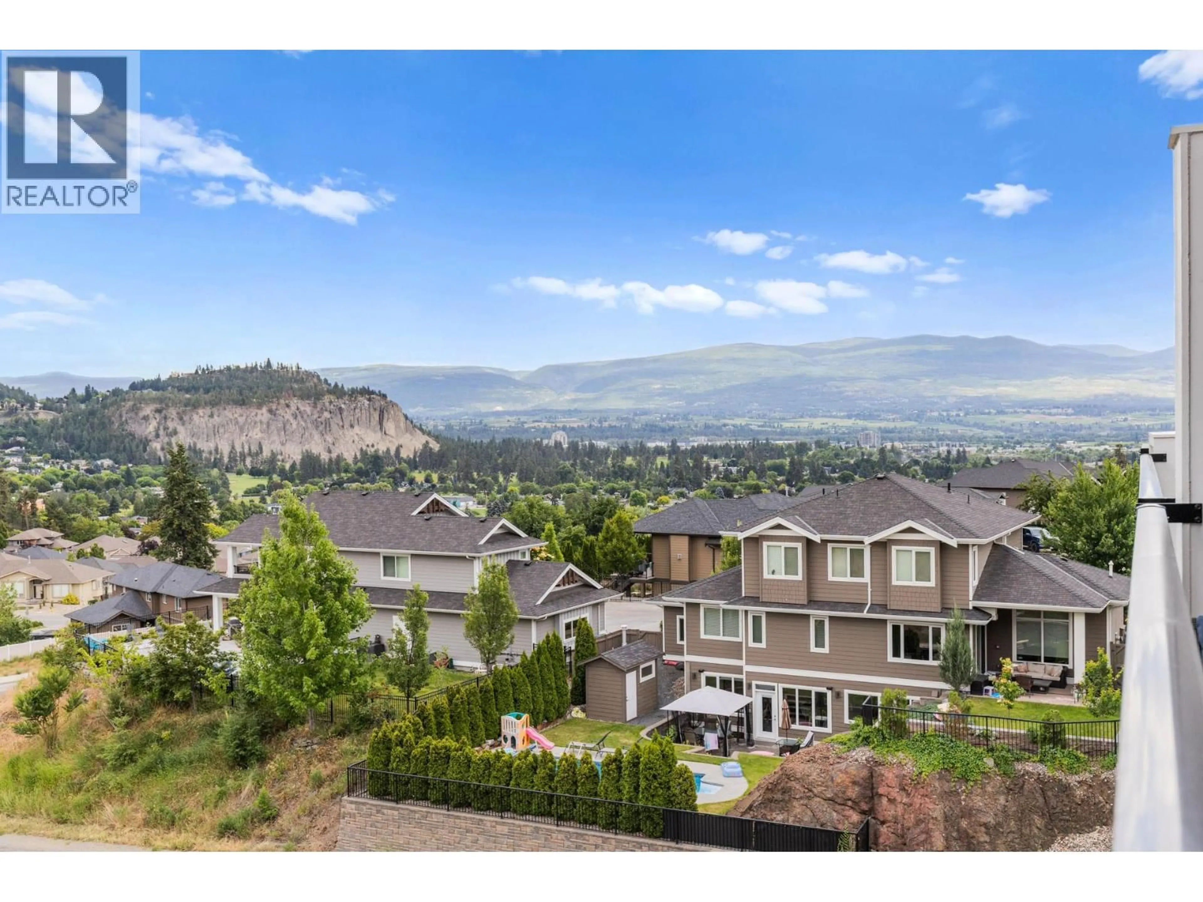 A pic from outside/outdoor area/front of a property/back of a property/a pic from drone, mountain view for 61 - 685 BOYNTON PLACE, Kelowna British Columbia V1V0G7