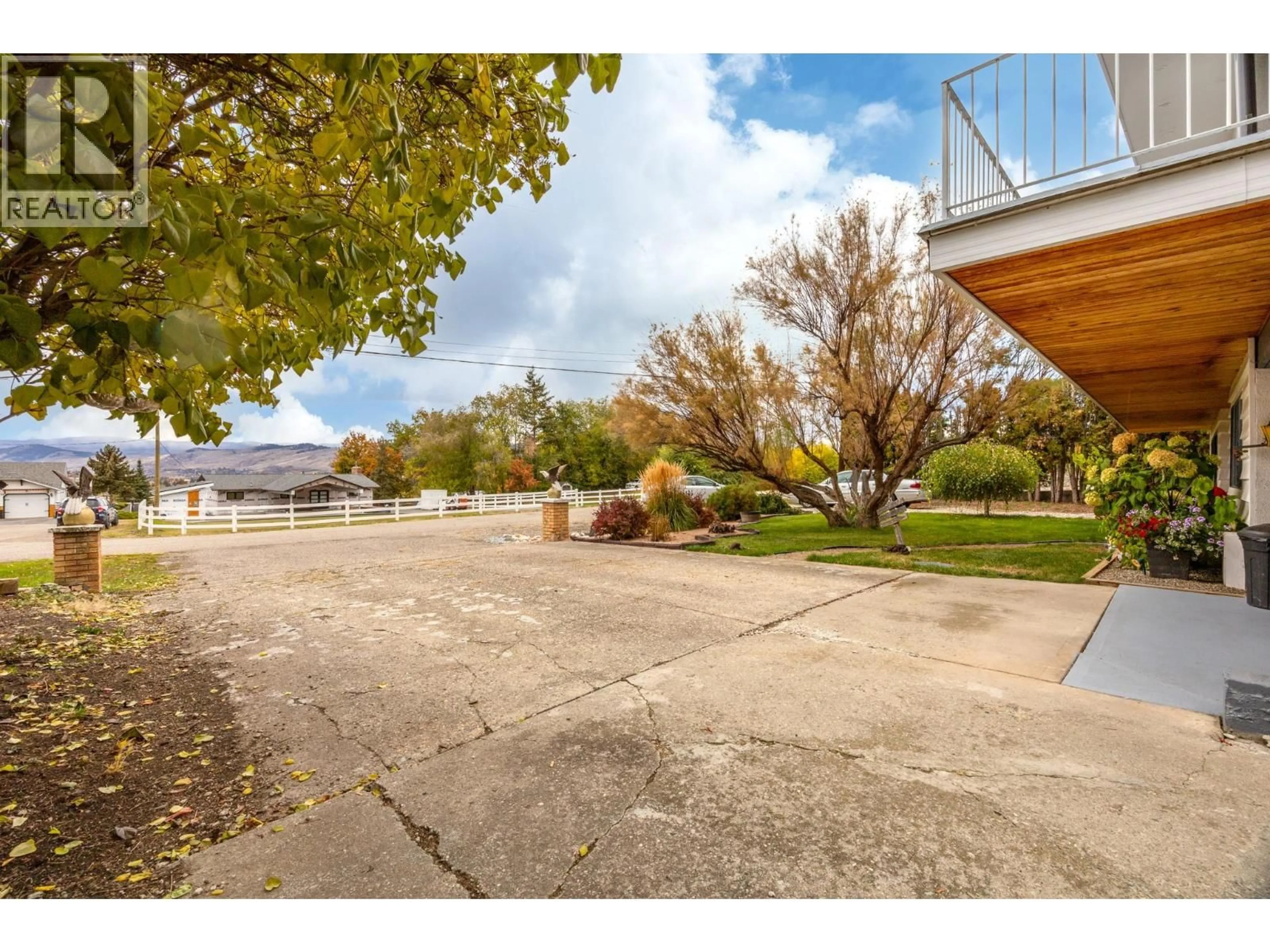 A pic from outside/outdoor area/front of a property/back of a property/a pic from drone, street for 647 DOWNIE ROAD, Vernon British Columbia V1B3A9