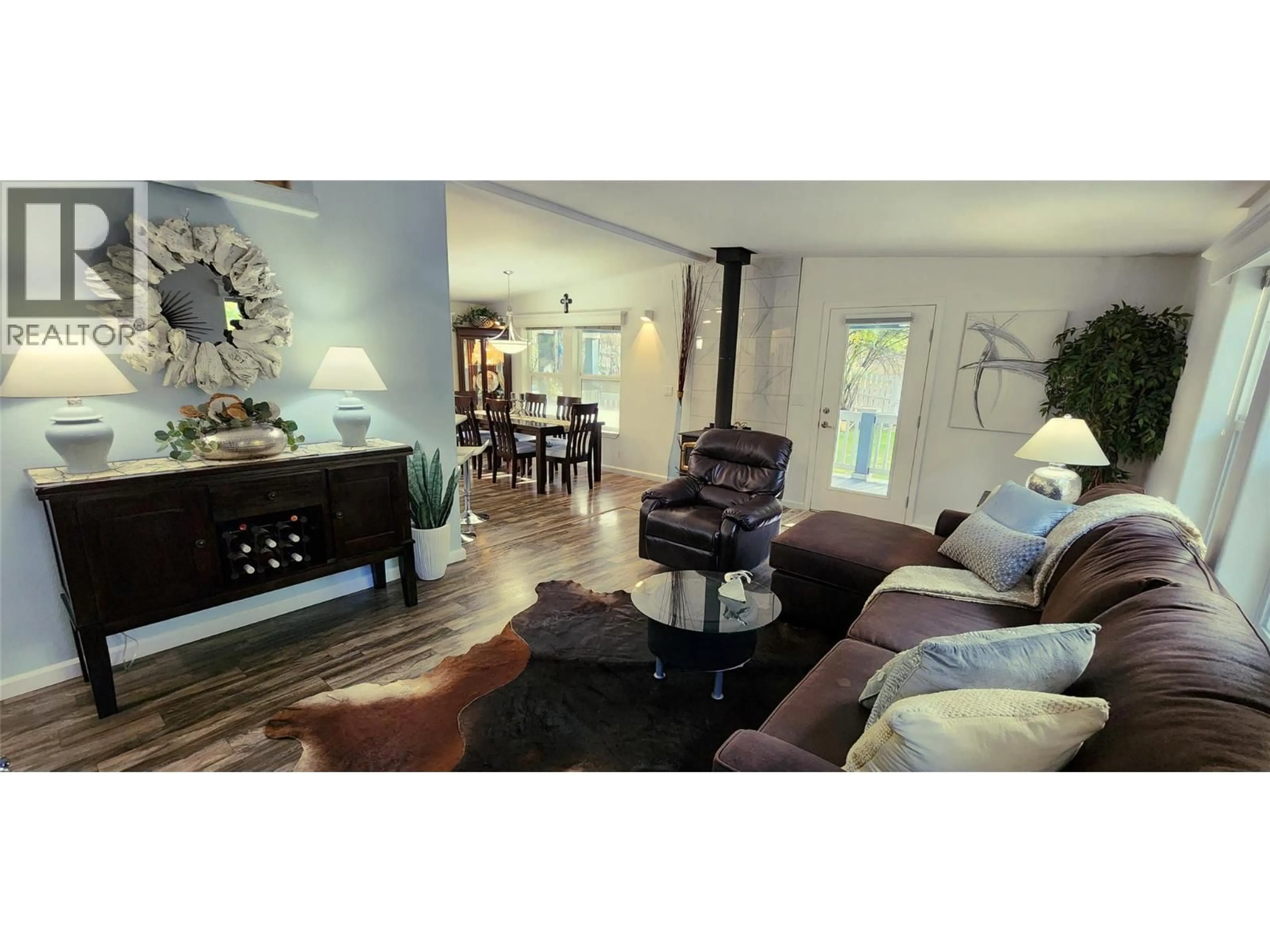 Living room with furniture, wood/laminate floor for 5302 WEBSTER STREET, Hedley British Columbia V0X1K0