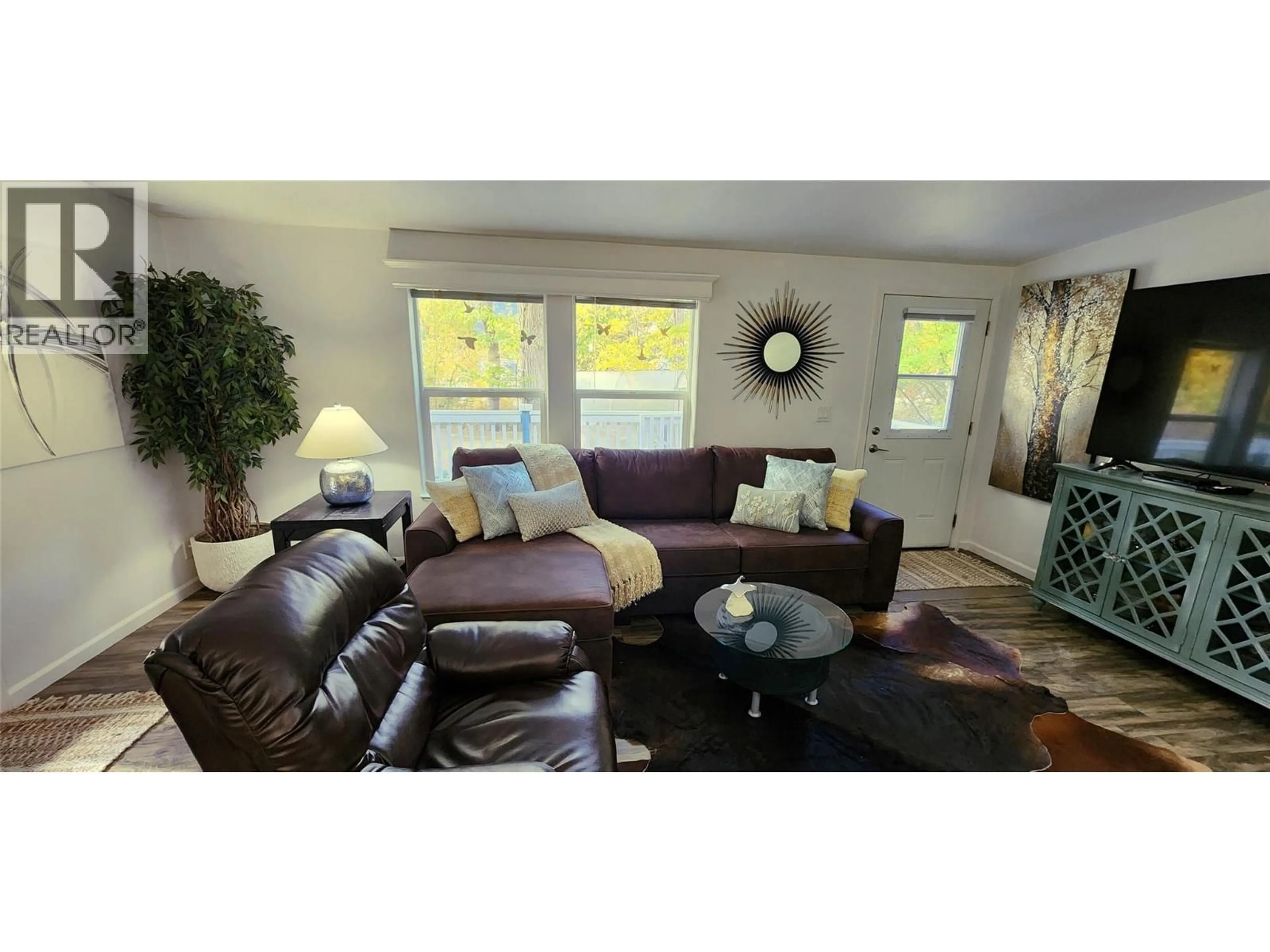 Living room with furniture, wood/laminate floor for 5302 WEBSTER STREET, Hedley British Columbia V0X1K0