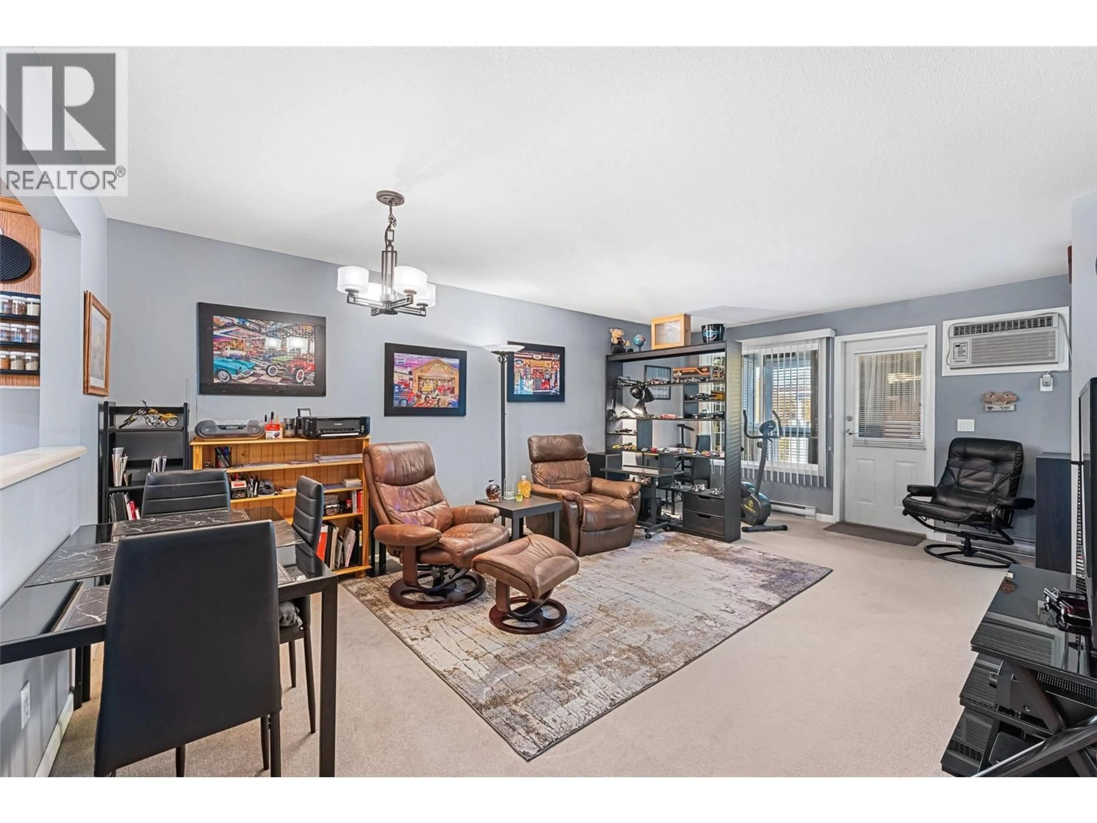 Living room with furniture, unknown for 309 - 980 GLENWOOD AVENUE, Kelowna British Columbia V1Y9P2