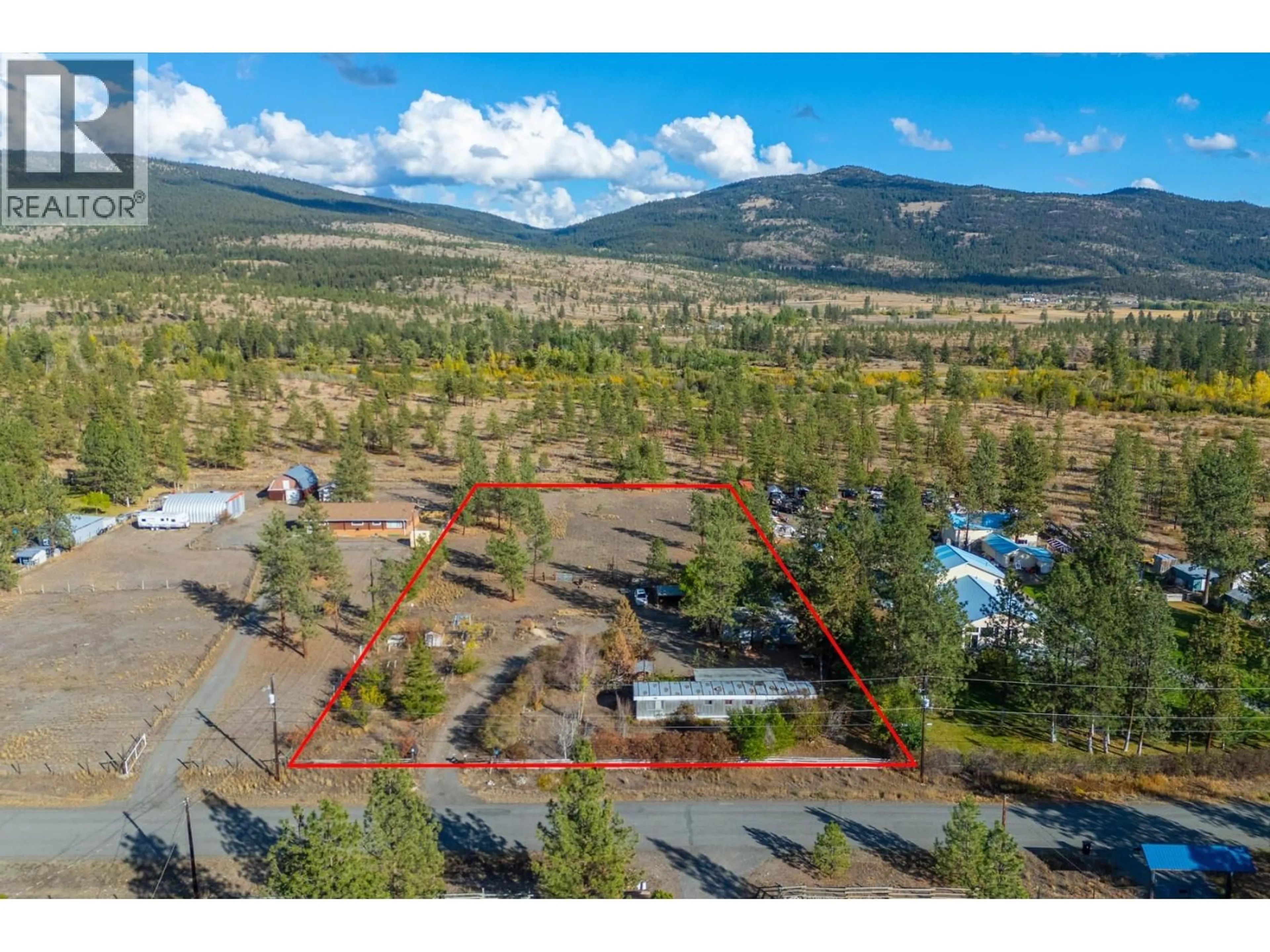 A pic from outside/outdoor area/front of a property/back of a property/a pic from drone, mountain view for 2528 KINVIG STREET, Merritt British Columbia V0K1Y0