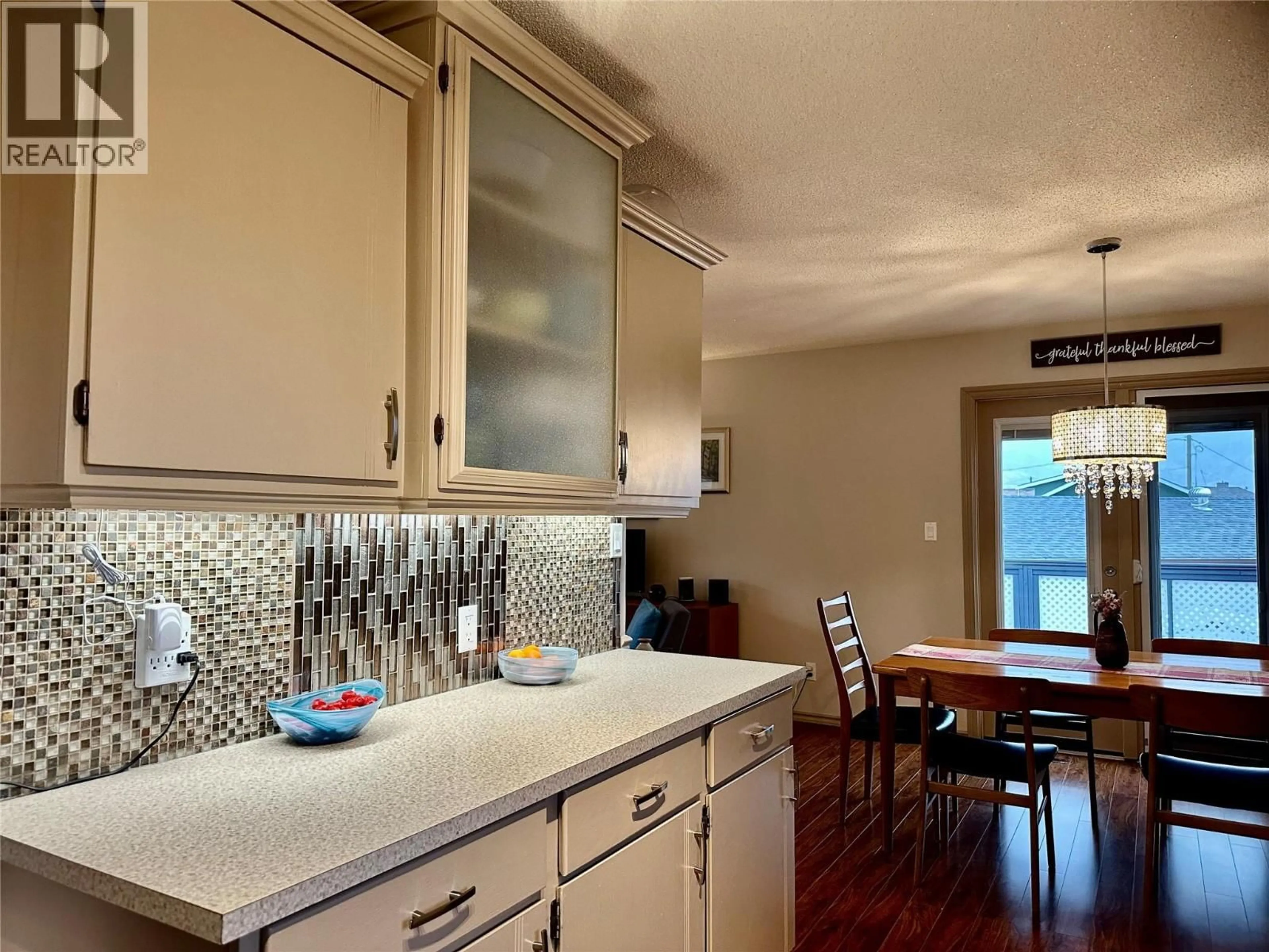 Open concept kitchen, ceramic/tile floor for 971 DIVIDEND COURT, Oliver British Columbia V0H1T6