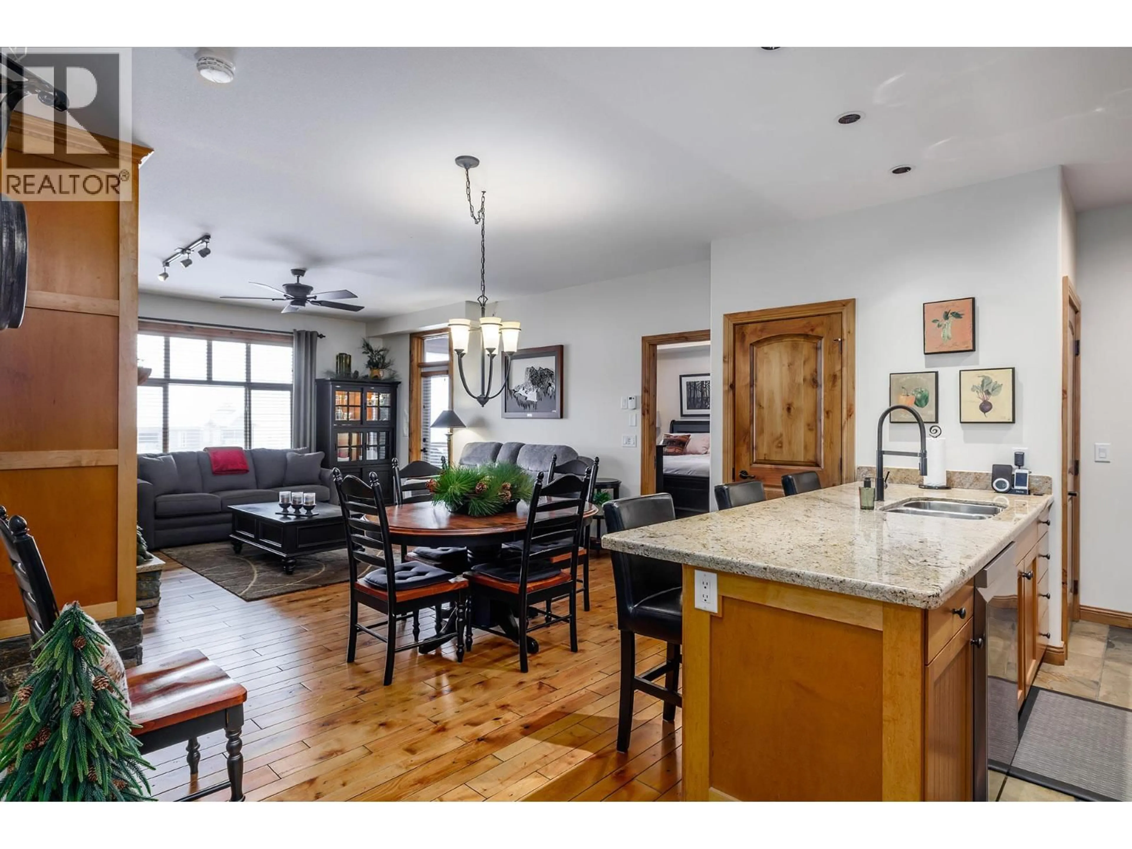 Open concept kitchen, wood/laminate floor for 4-602 - 7700 PORCUPINE ROAD, Big White British Columbia V1P1P3