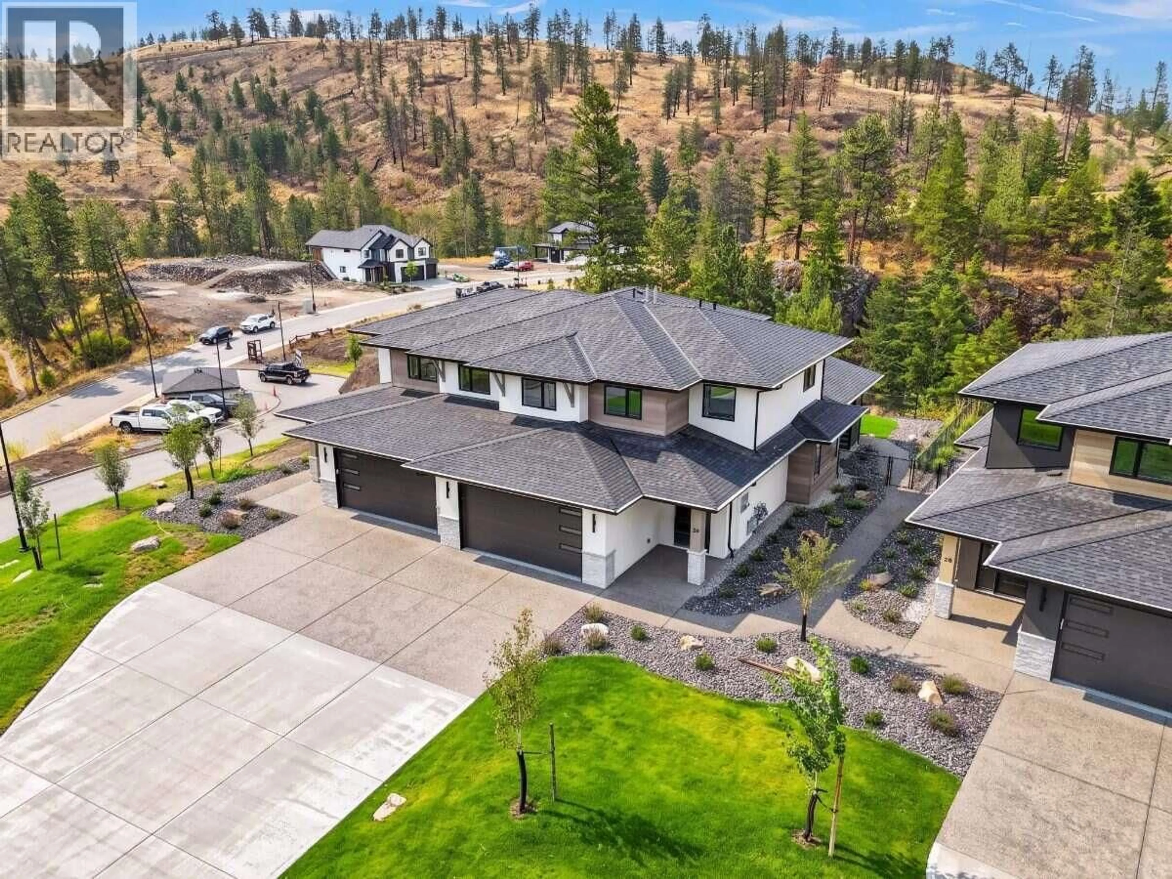 A pic from outside/outdoor area/front of a property/back of a property/a pic from drone, mountain view for 29 - 1720 HIDDEN HILLS DRIVE, Kelowna British Columbia V1V0J5