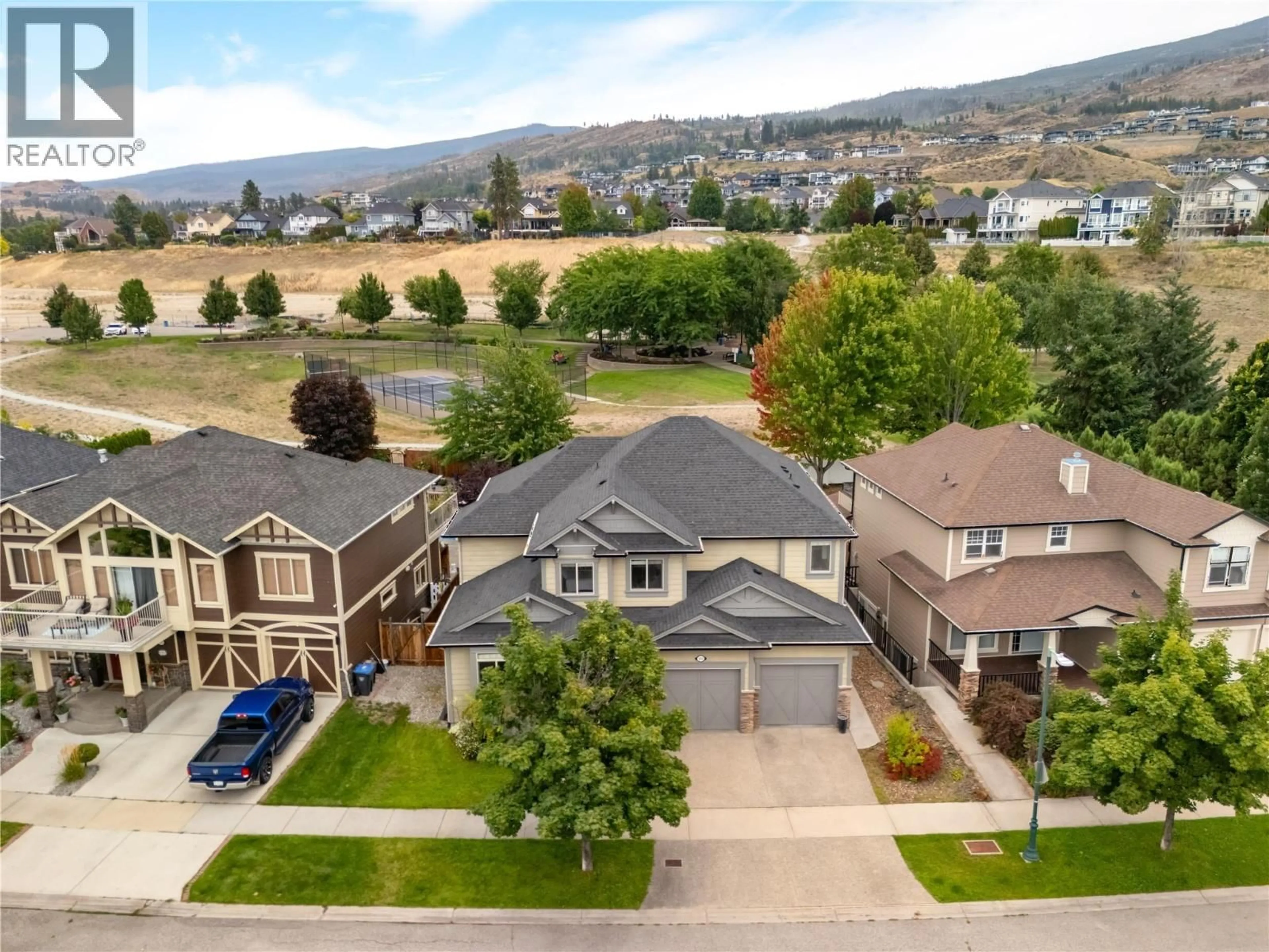 A pic from outside/outdoor area/front of a property/back of a property/a pic from drone, mountain view for 353 QUILCHENA DRIVE, Kelowna British Columbia V1W4V3