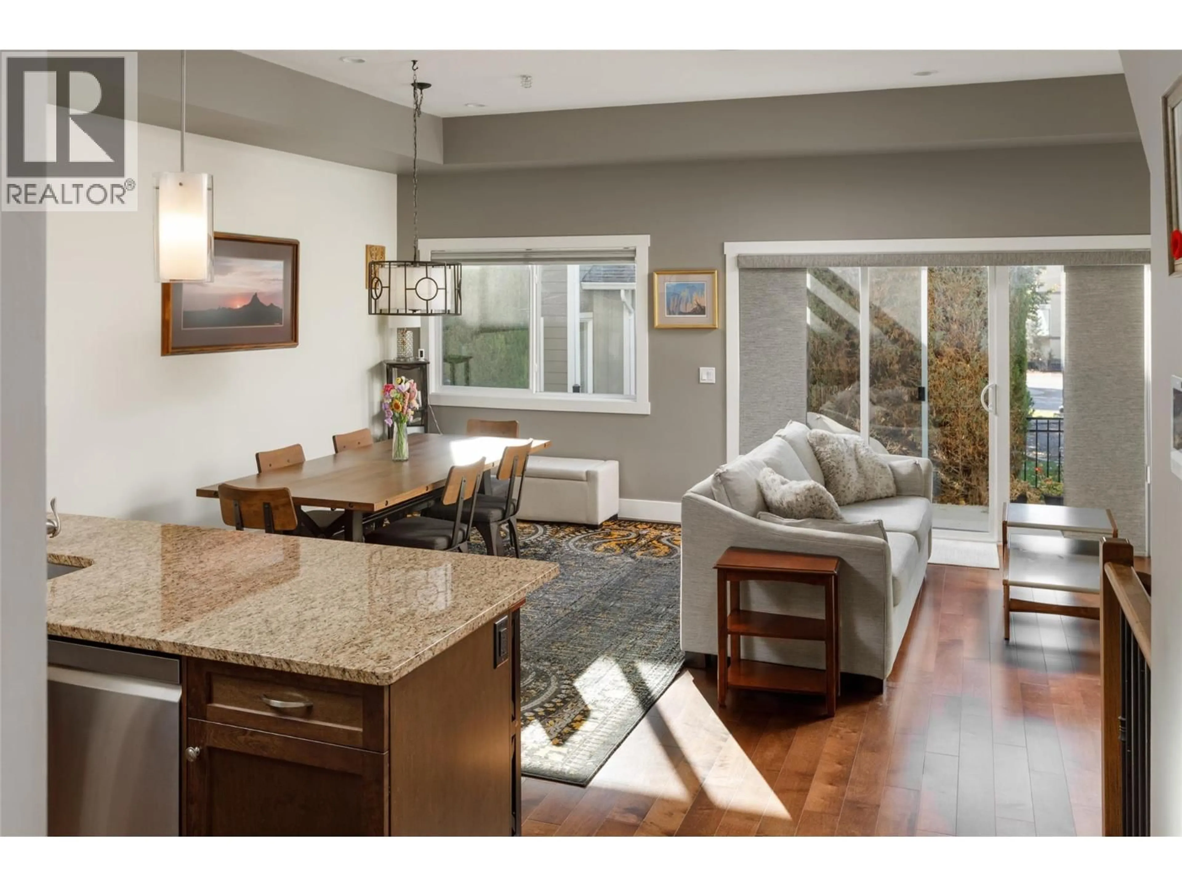 Open concept kitchen, wood/laminate floor for 53 - 600 BOYNTON PLACE, Kelowna British Columbia V1V1A6