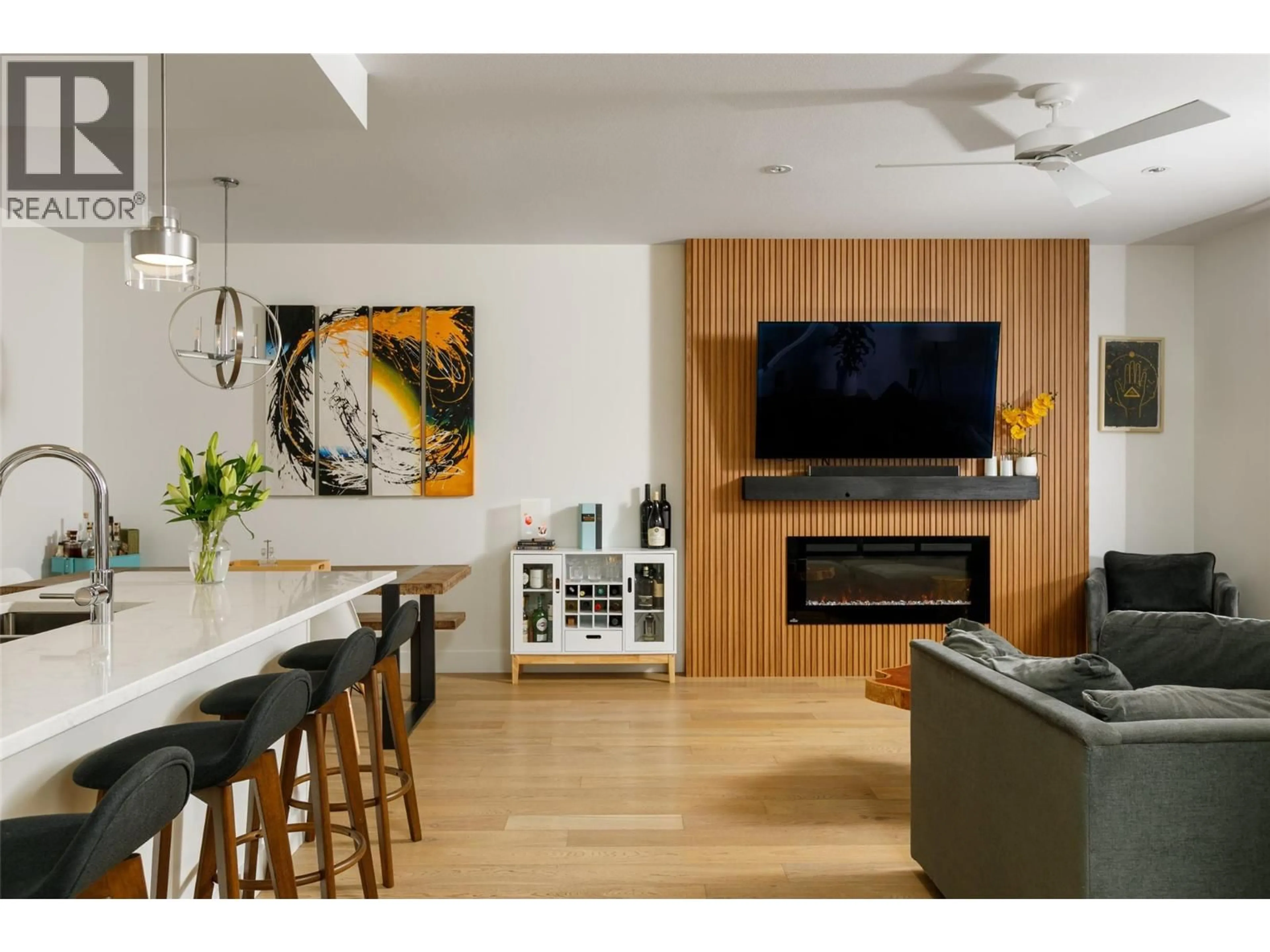 Open concept kitchen, wood/laminate floor for 1025 CAWSTON AVENUE, Kelowna British Columbia V1Y9X2