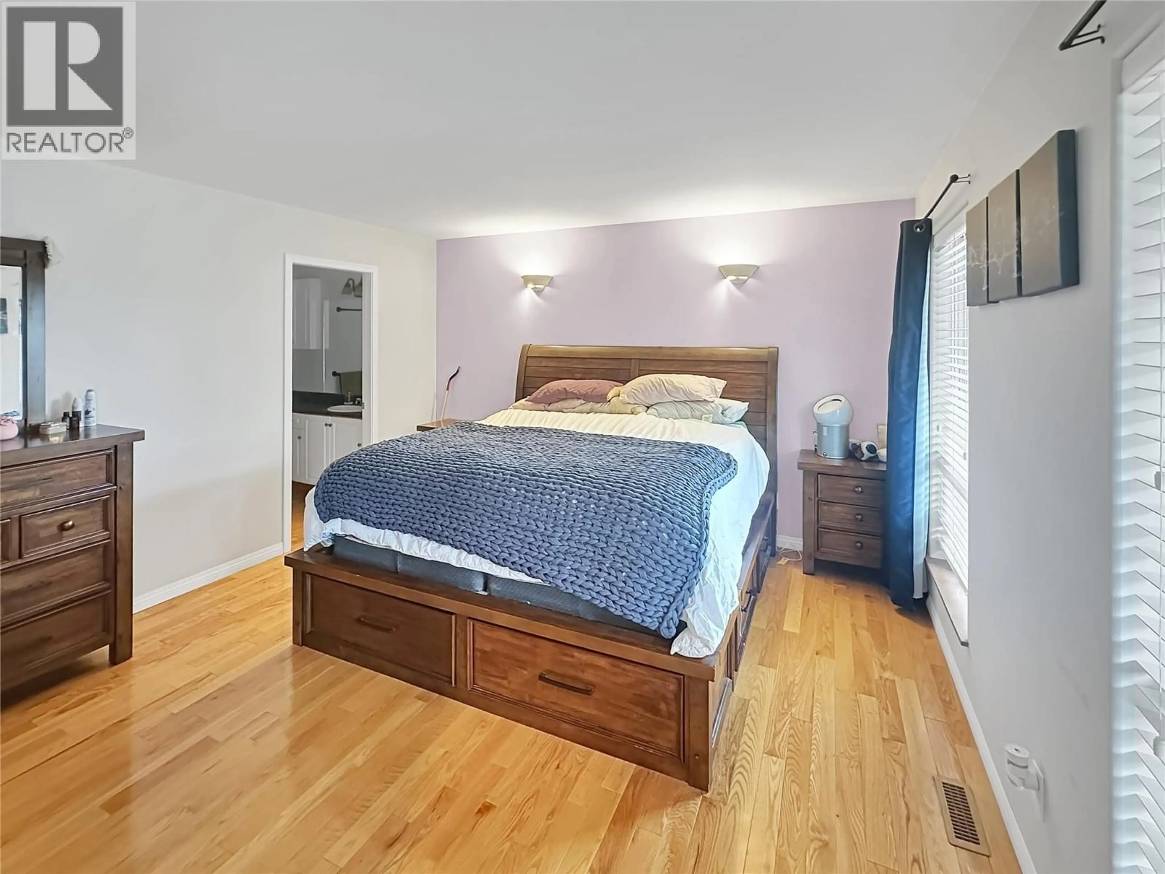 Bedroom with bed, wood/laminate floor for 100 DEERVIEW CRESCENT, Princeton British Columbia V0X1W0