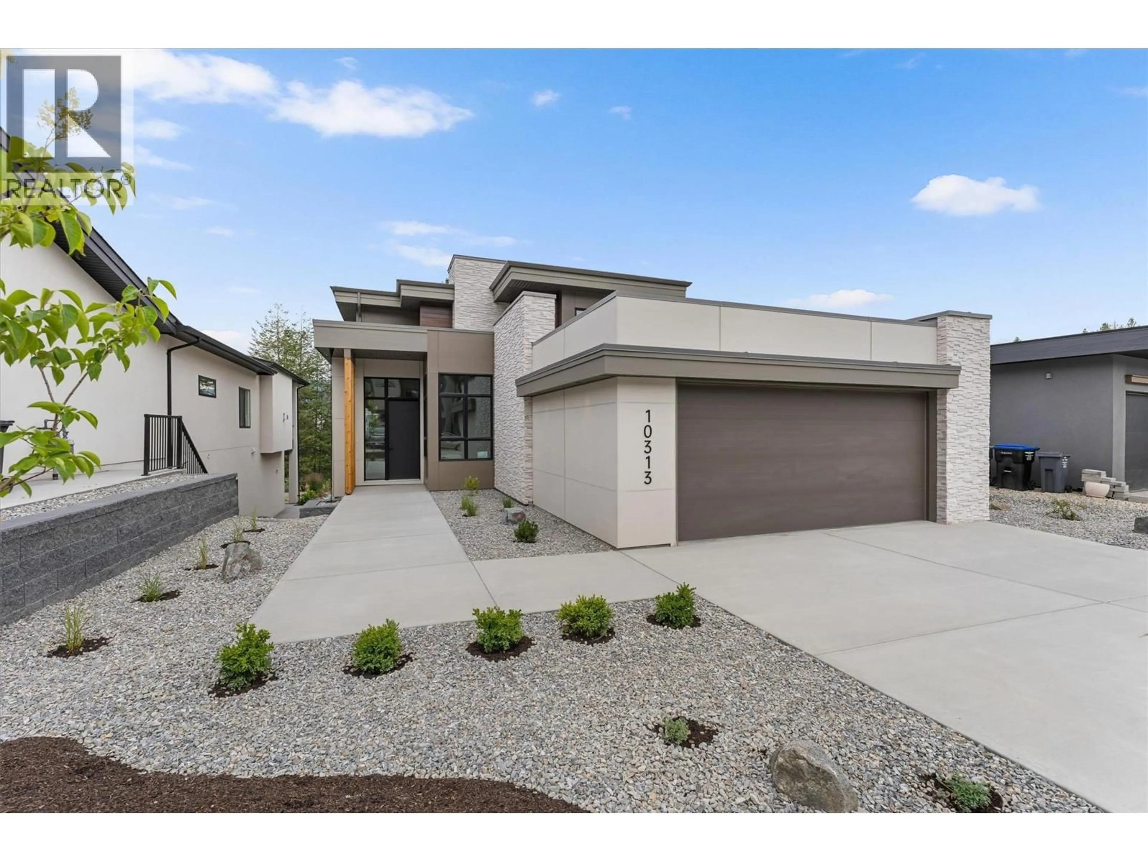 Home with brick exterior material, street for 10313 LONG ROAD, Lake Country British Columbia V4V0A9