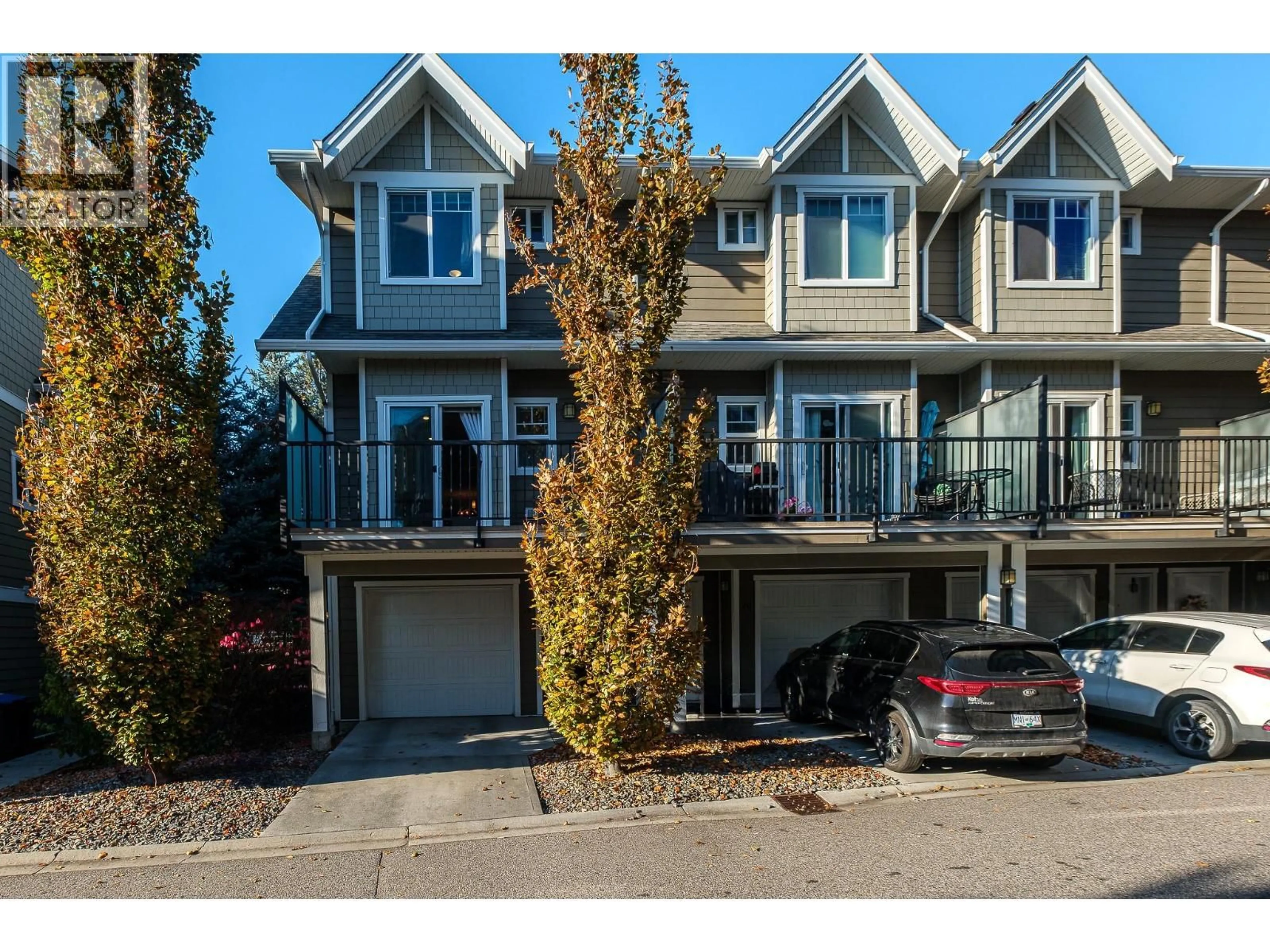 A pic from outside/outdoor area/front of a property/back of a property/a pic from drone, street for 19 - 600 SHERWOOD ROAD, Kelowna British Columbia V1W5K1