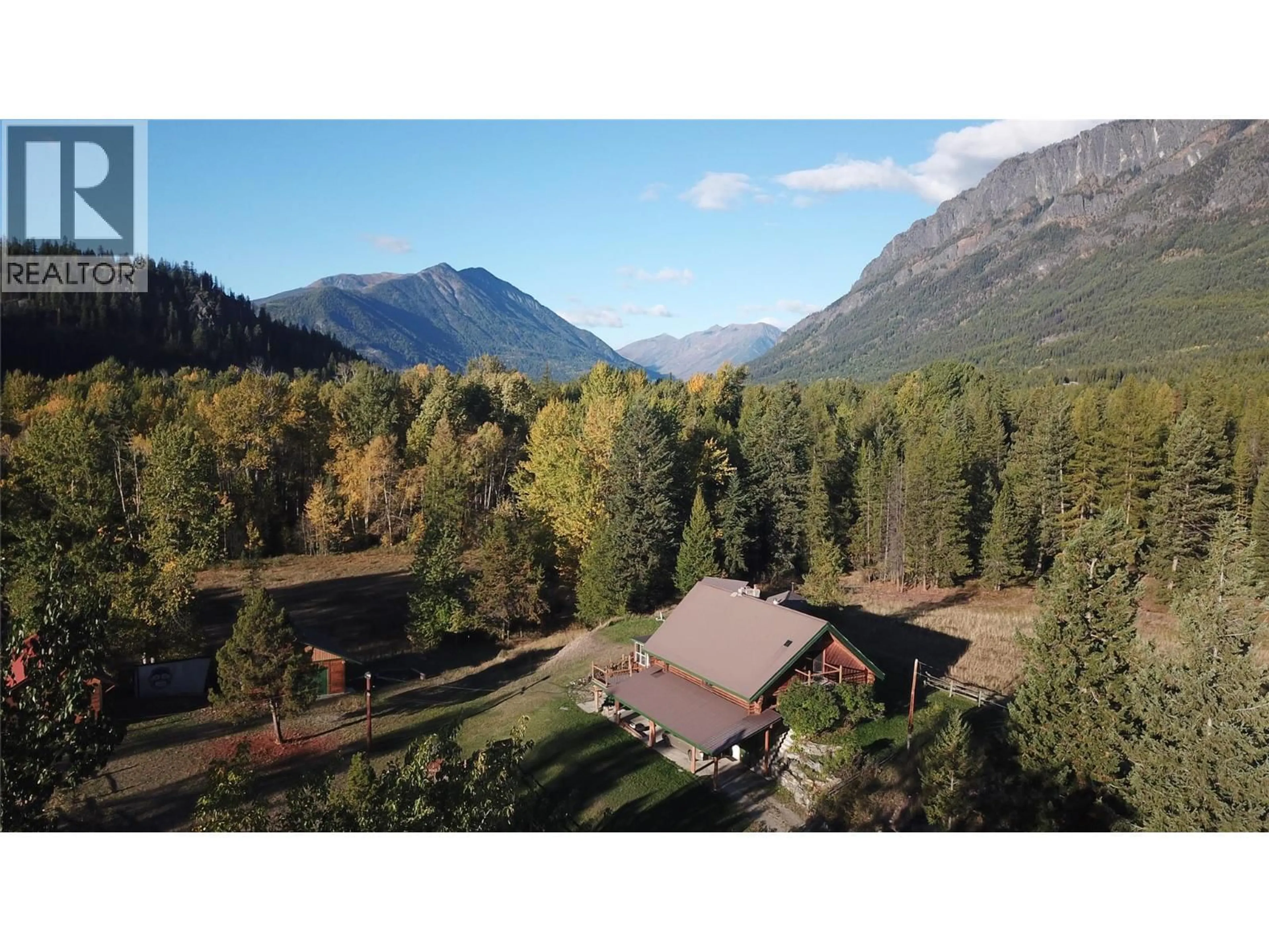 A pic from outside/outdoor area/front of a property/back of a property/a pic from drone, mountain view for 1896 ST. MARY LAKE ROAD, Kimberley British Columbia V1A3K4