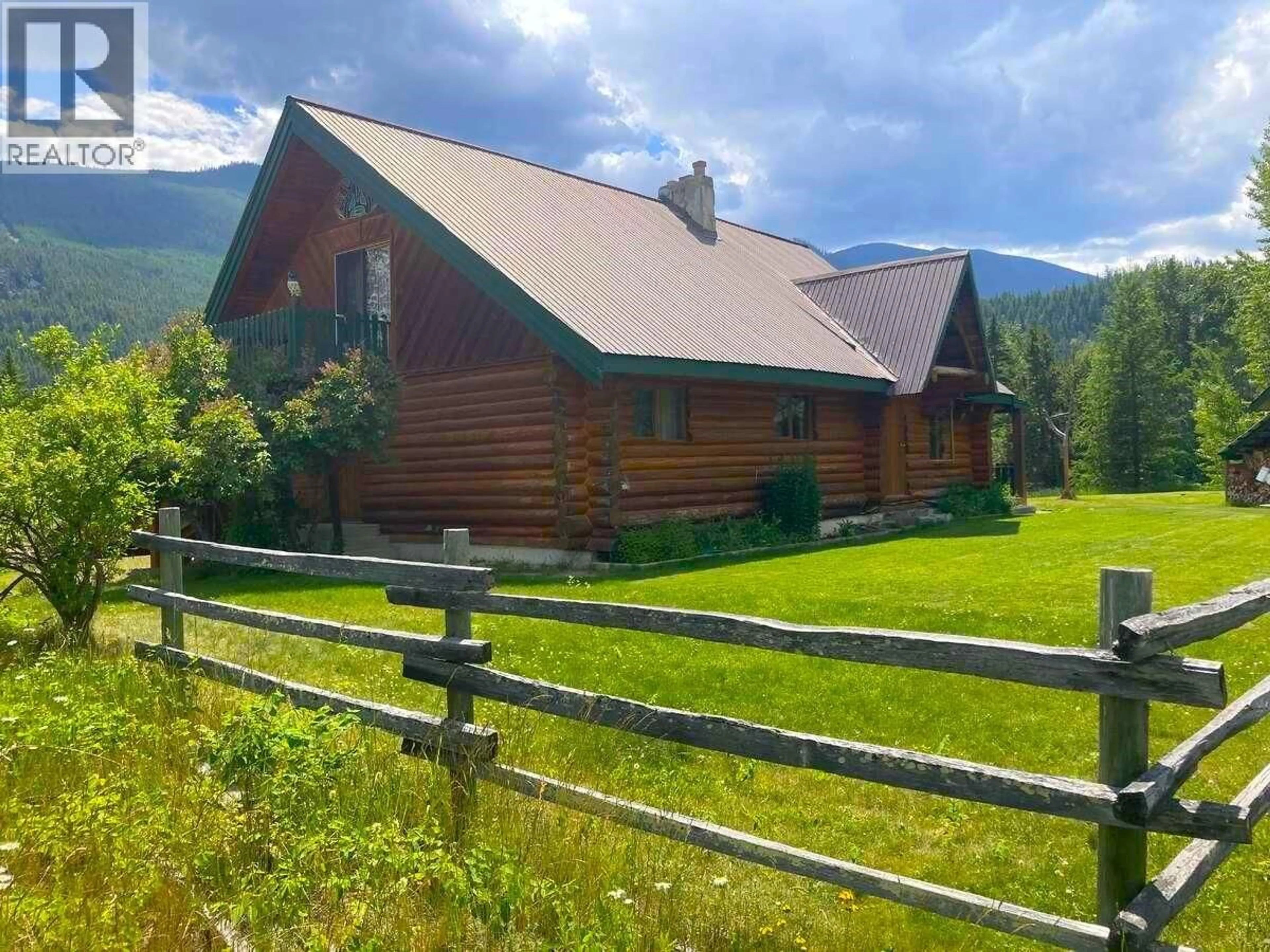 A pic from outside/outdoor area/front of a property/back of a property/a pic from drone, mountain view for 1896 ST. MARY LAKE ROAD, Kimberley British Columbia V1A3K4