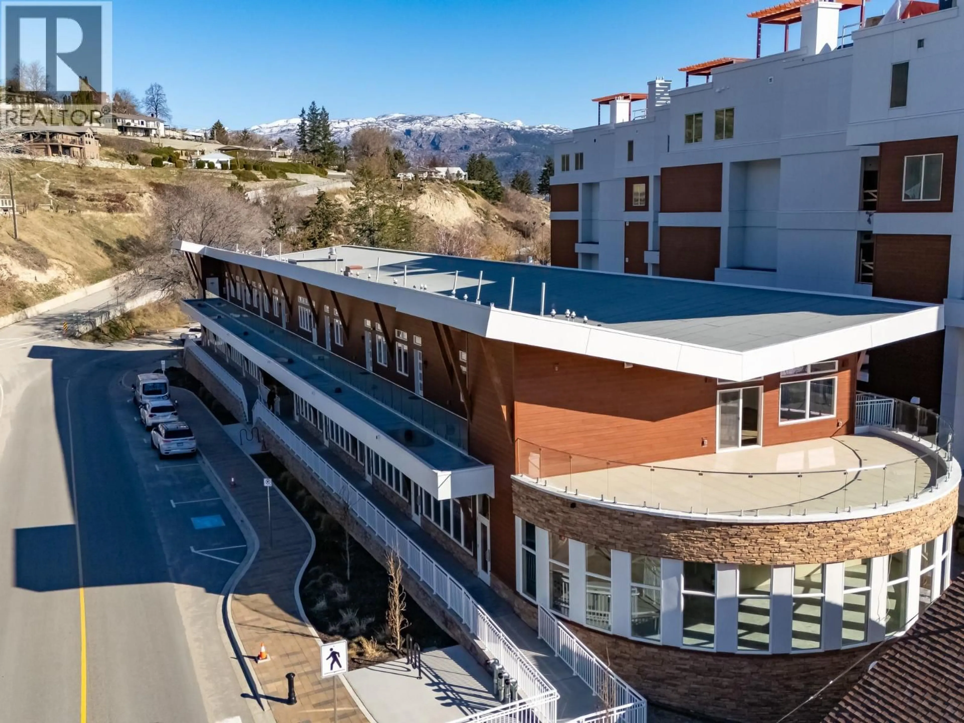 A pic from outside/outdoor area/front of a property/back of a property/a pic from drone, unknown for 201 - 13417 LAKESHORE DRIVE SOUTH, Summerland British Columbia V0H1Z1